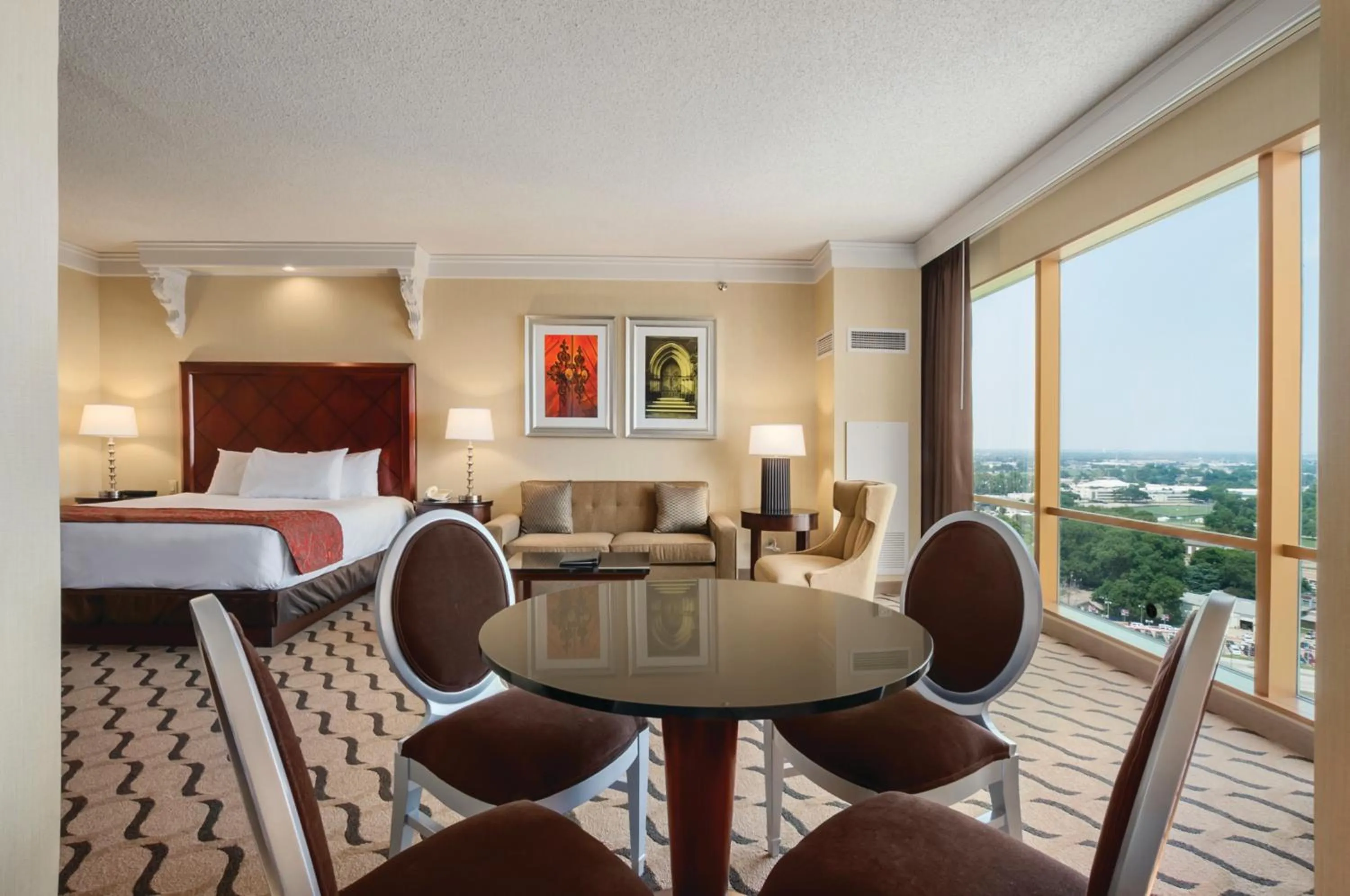 Seating area, Bed in Horseshoe Bossier City, A Caesars Destination