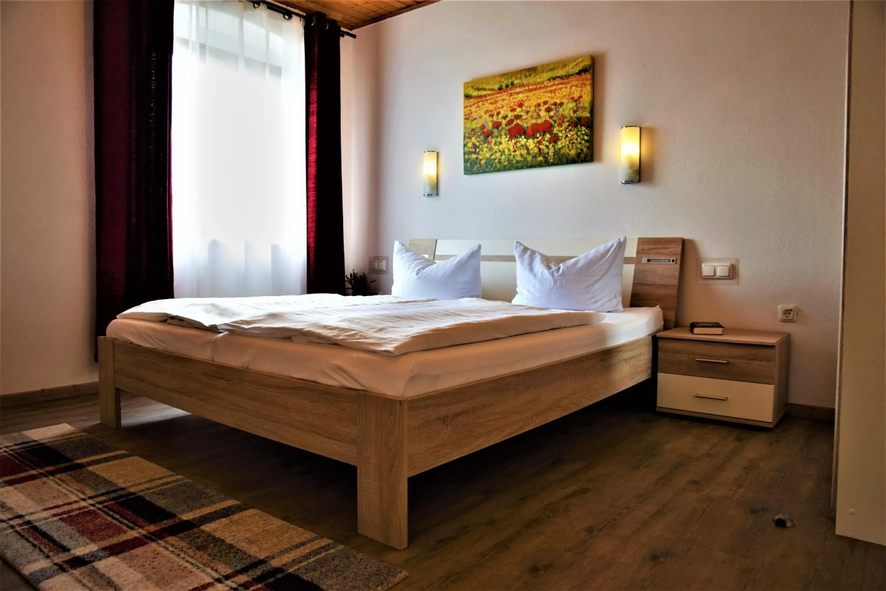 Bed in Landhotel Steigerwaldhaus