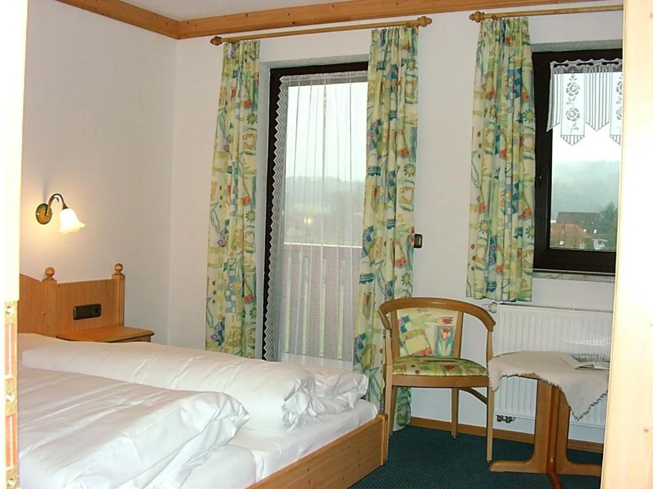 Photo of the whole room, Bed in Landhotel Steigerwaldhaus