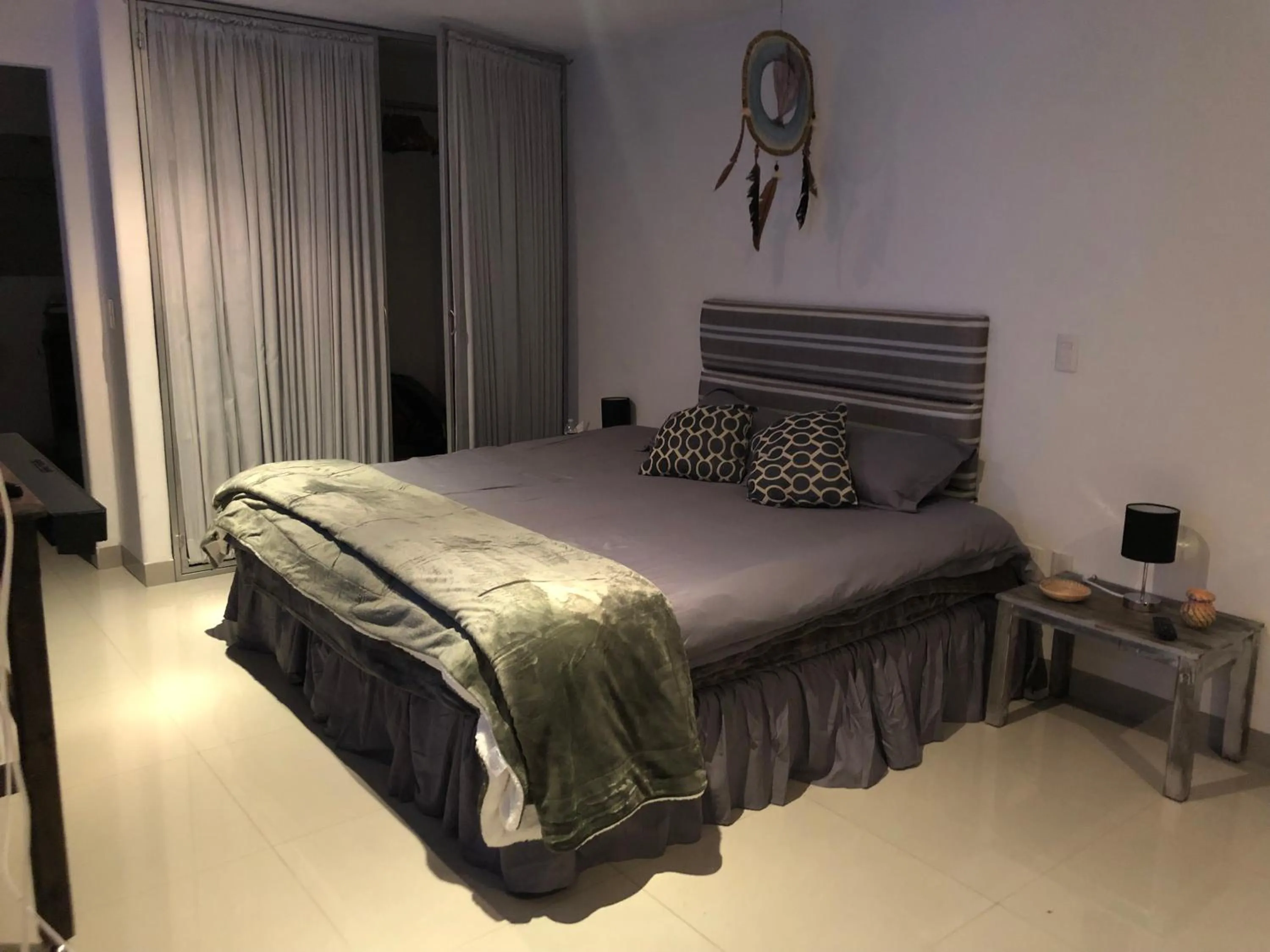 Bed in Magnolias Boutique Suites & SPA