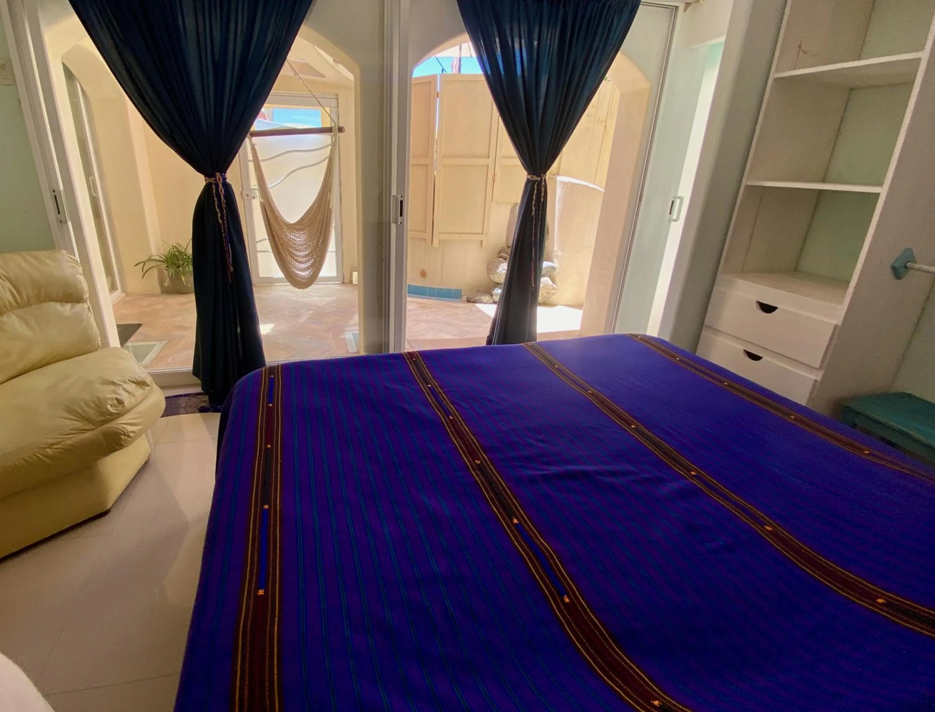 Bed in Magnolias Boutique Suites & SPA