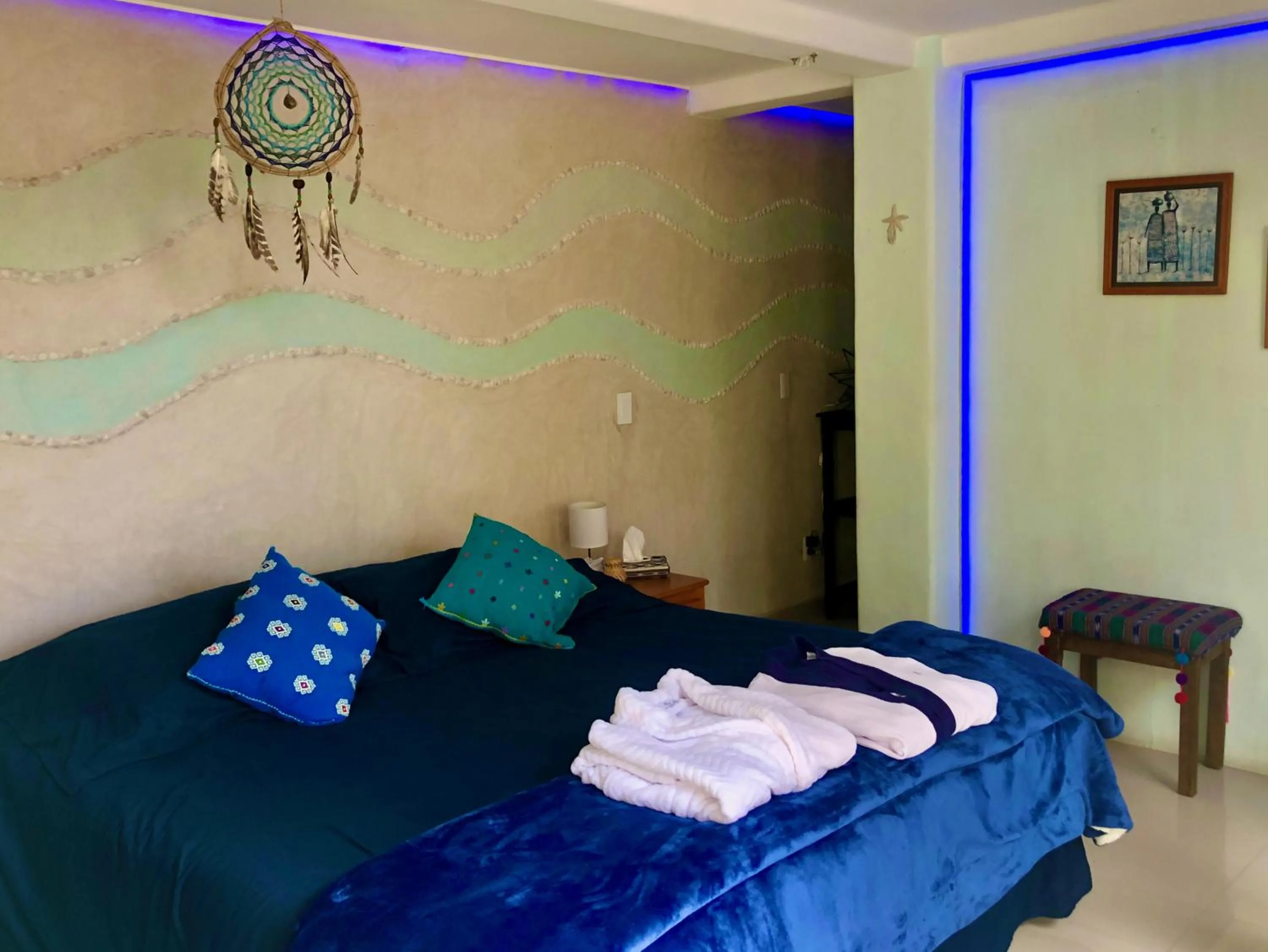 Bed in Magnolias Boutique Suites & SPA