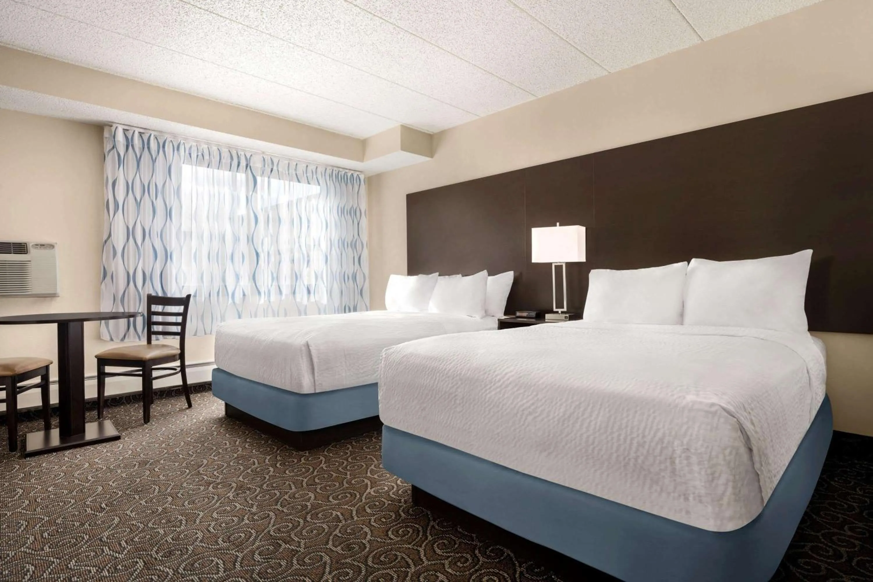 Bedroom, Bed in Days Inn by Wyndham Fort Collins