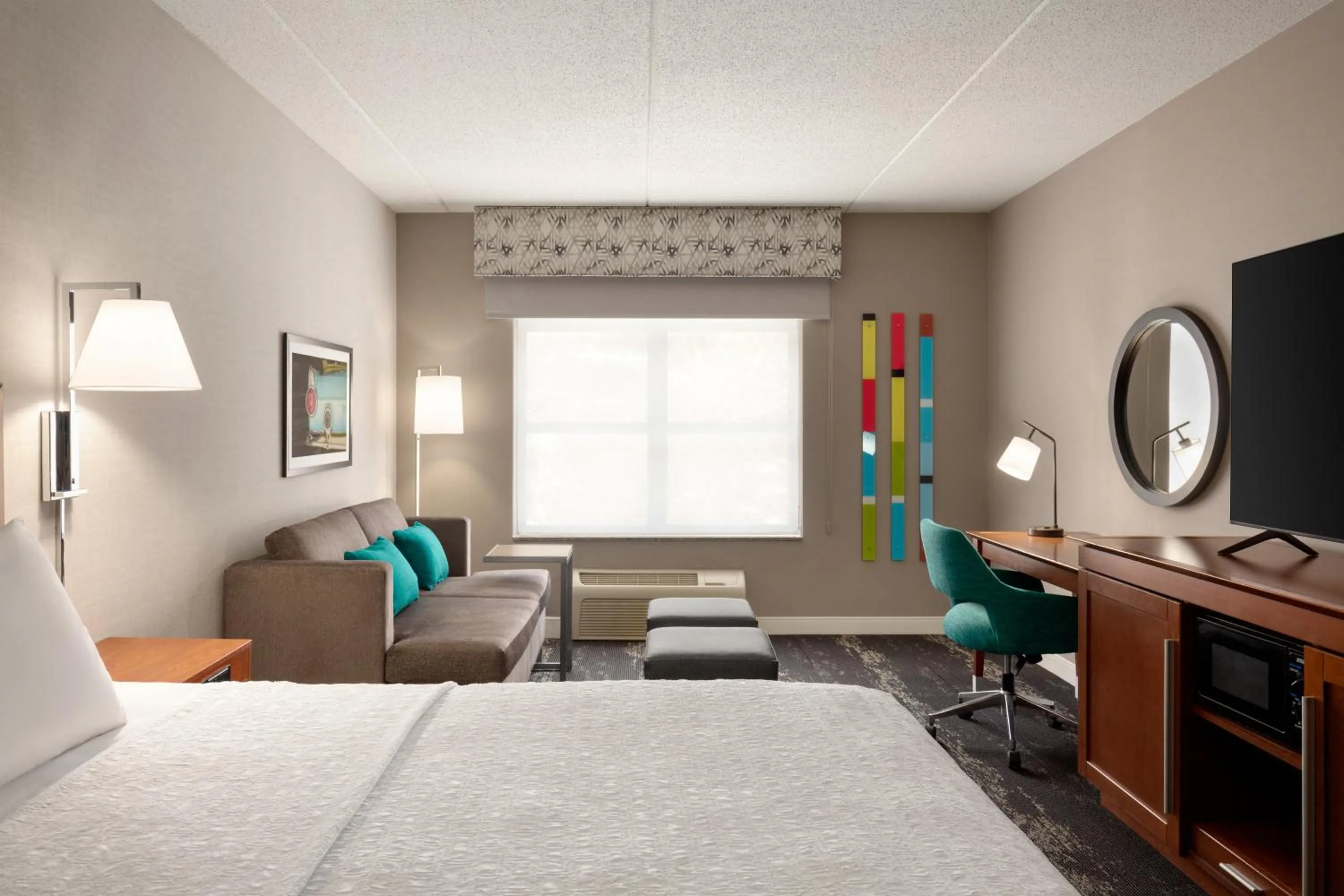 Bed in Hampton Inn at Tin Lizzie Gaming Resort