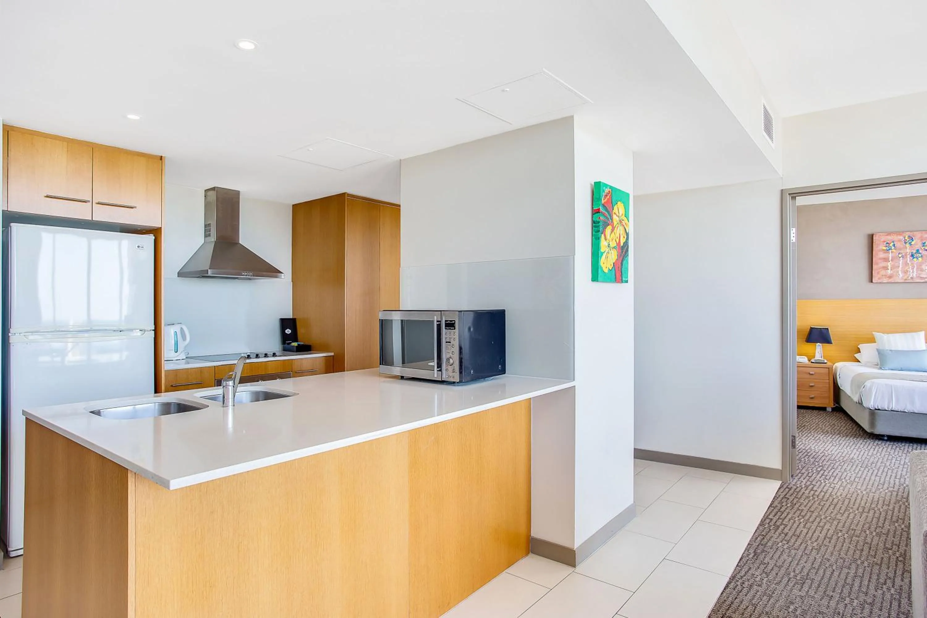 Kitchen or kitchenette, Bed in Mantra Twin Towns
