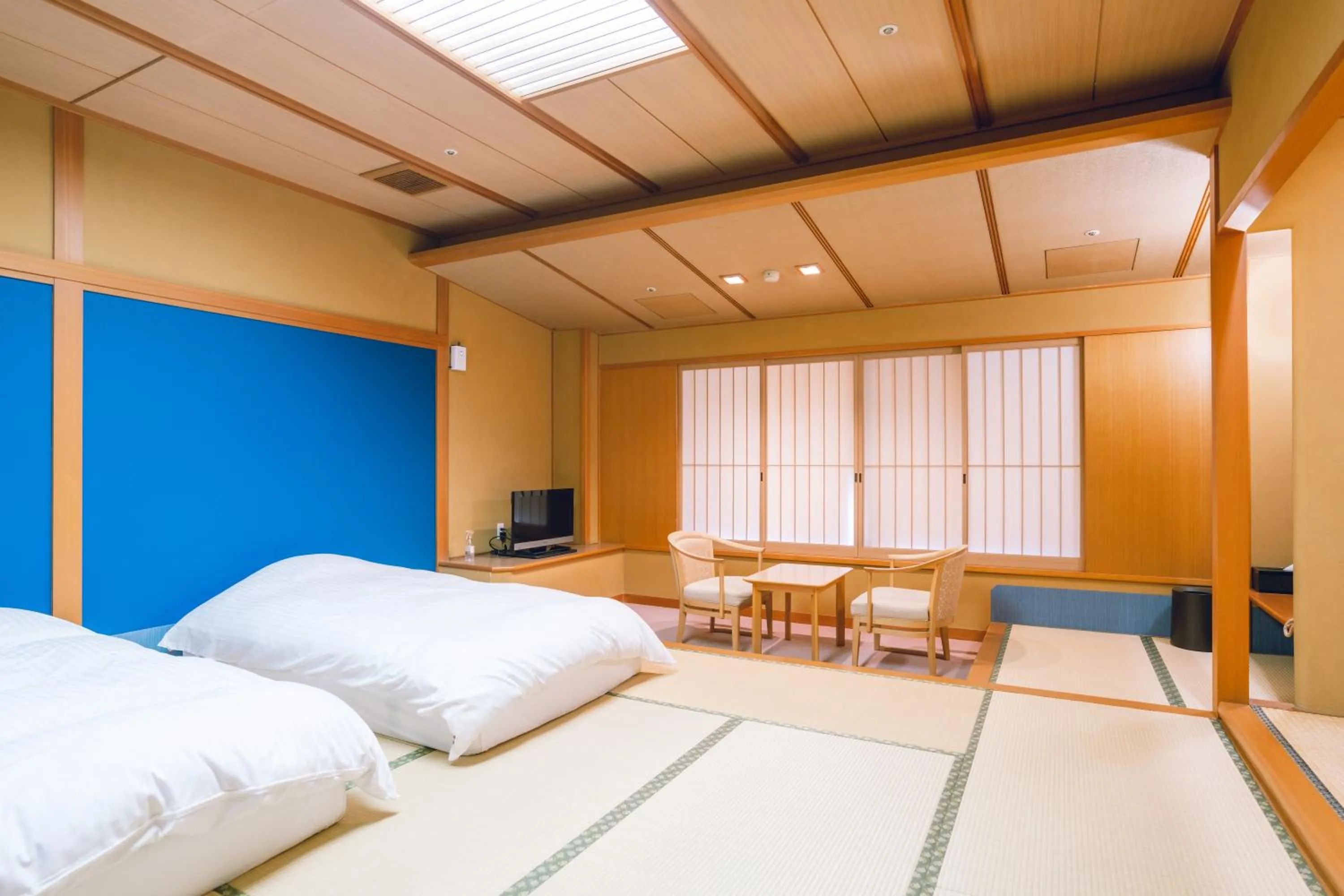 Bed in Tamatsukuri Grand Hotel Choseikaku