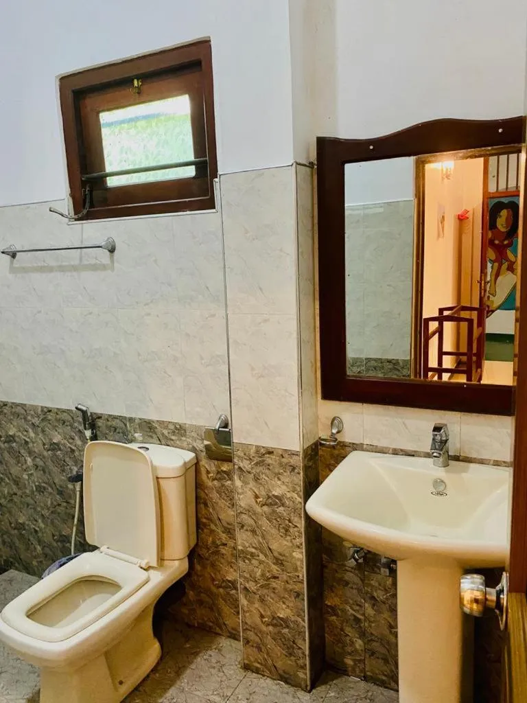 Bedroom in Gihan Guesthouse