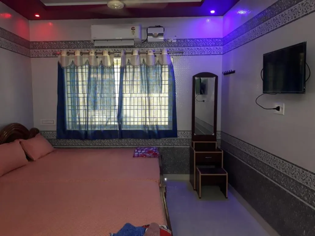 Bed in Sri Priya Lodge