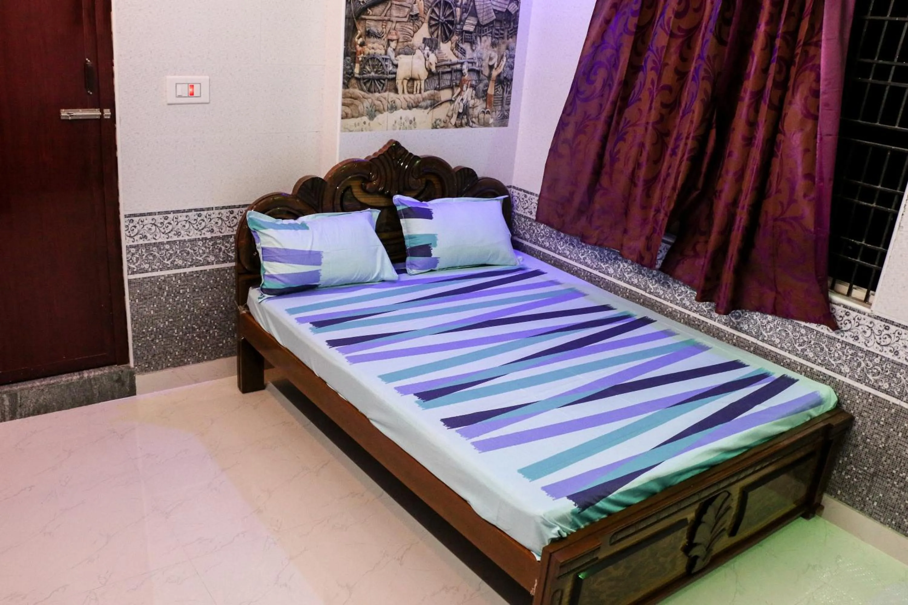 Bed in Sri Priya Lodge