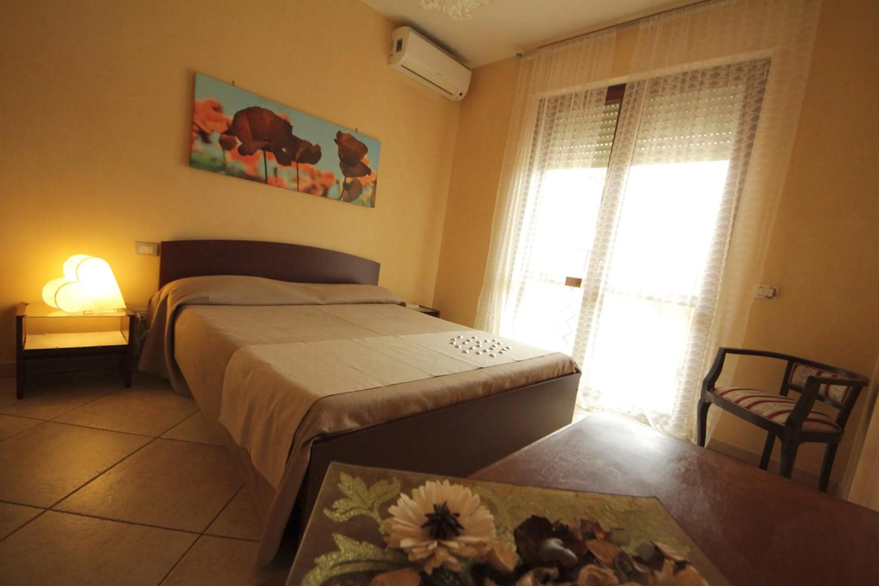 Bed in B&B La Rosa Blu