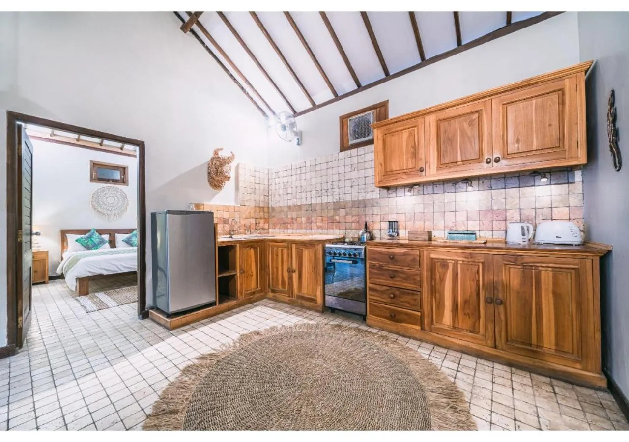 Kitchen or kitchenette in Tír na nÓg Beachfront Resort