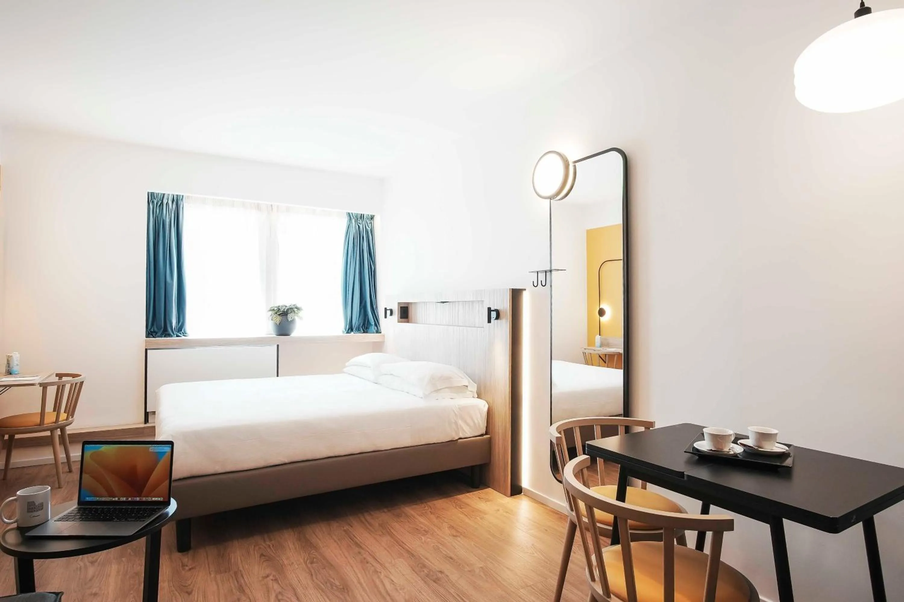 Bed in Aparthotel Colombo Roma