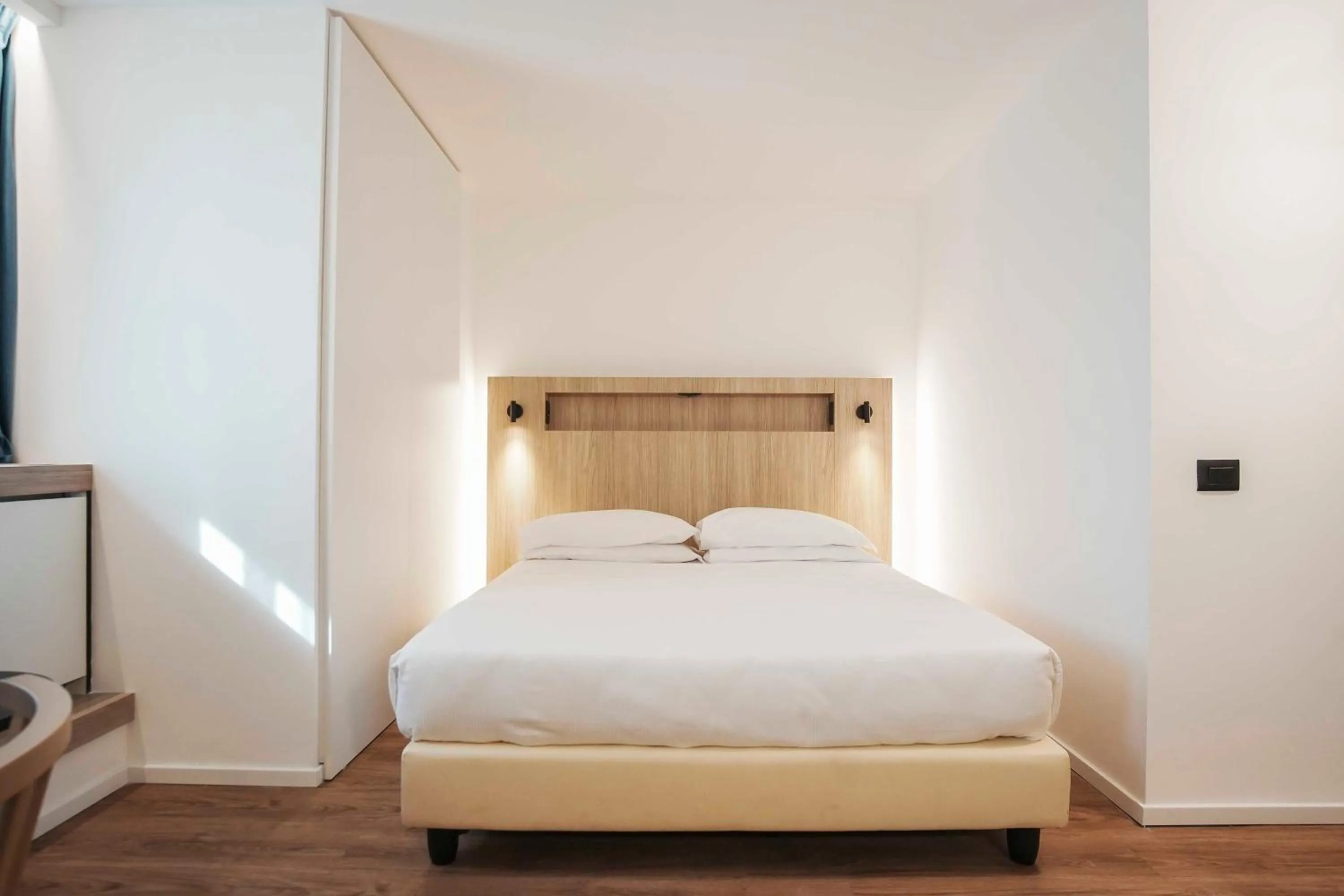 Bed in Aparthotel Colombo Roma