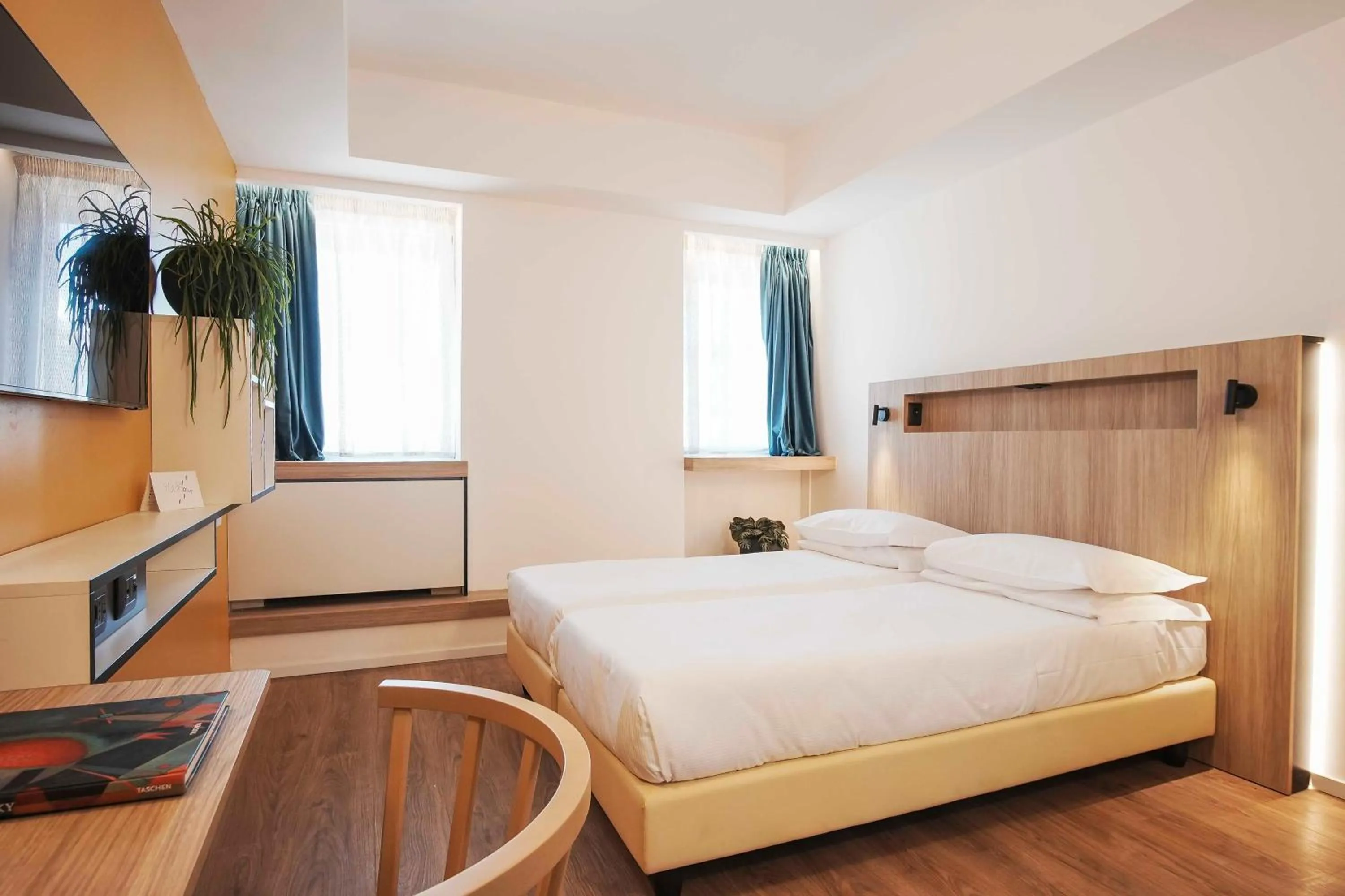 Bed in Aparthotel Colombo Roma