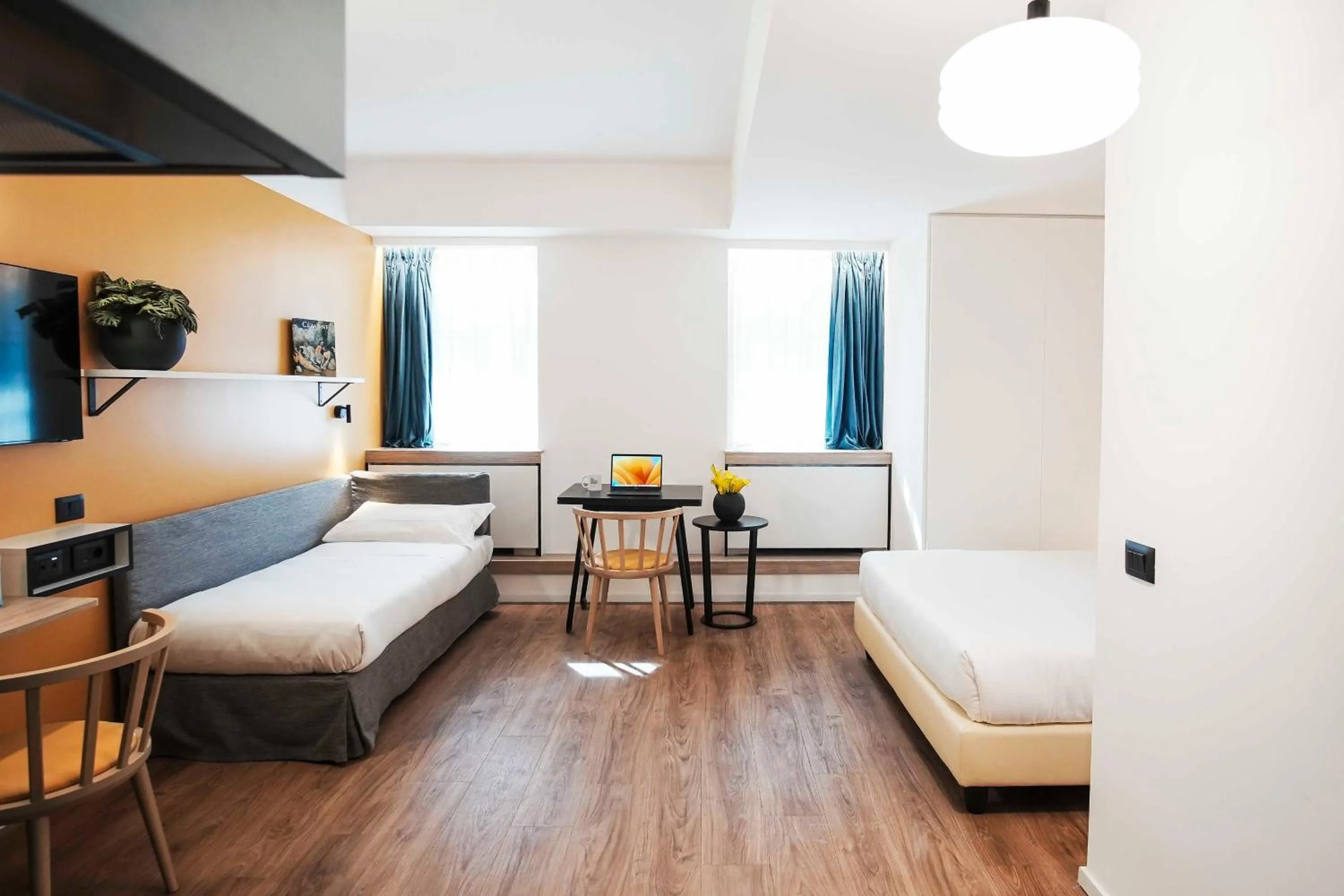 Bed in Aparthotel Colombo Roma