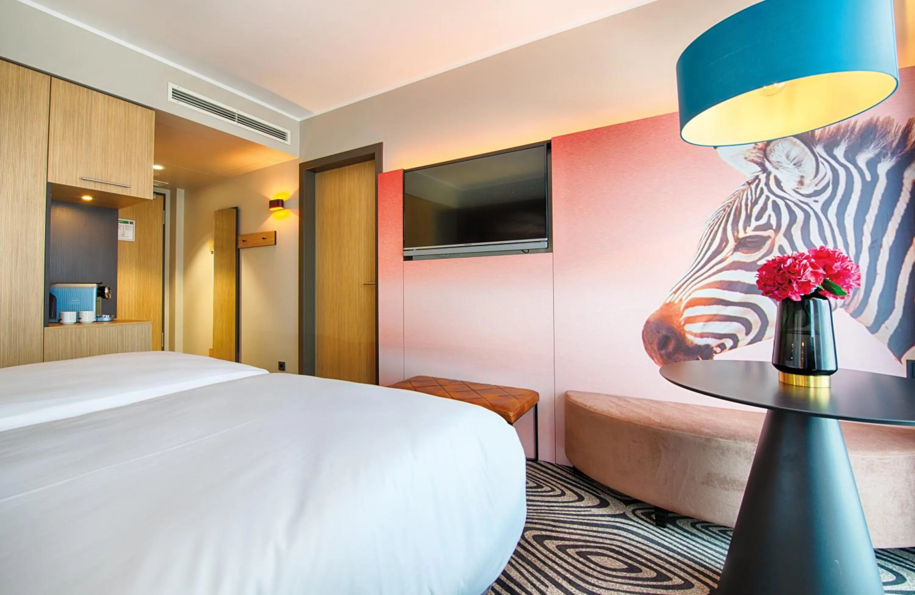 Photo of the whole room, Bed in NYX Hotel Munich by Leonardo Hotels