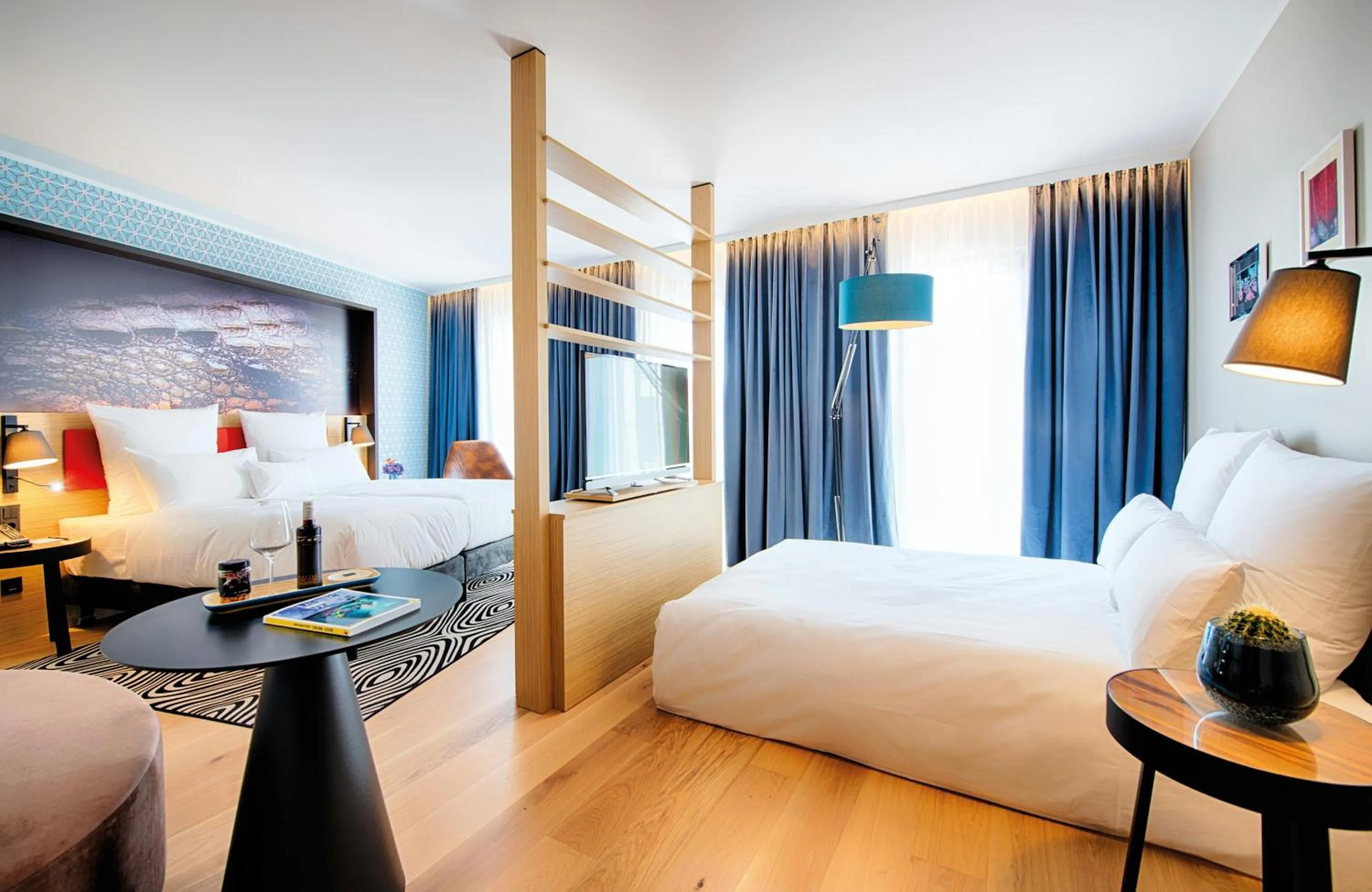 Photo of the whole room, Bed in NYX Hotel Munich by Leonardo Hotels