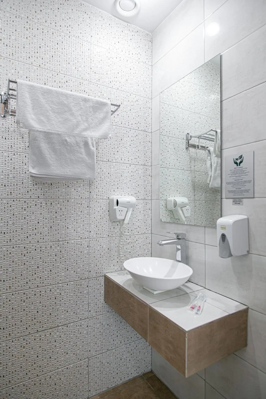 Shower in Astra Hotel