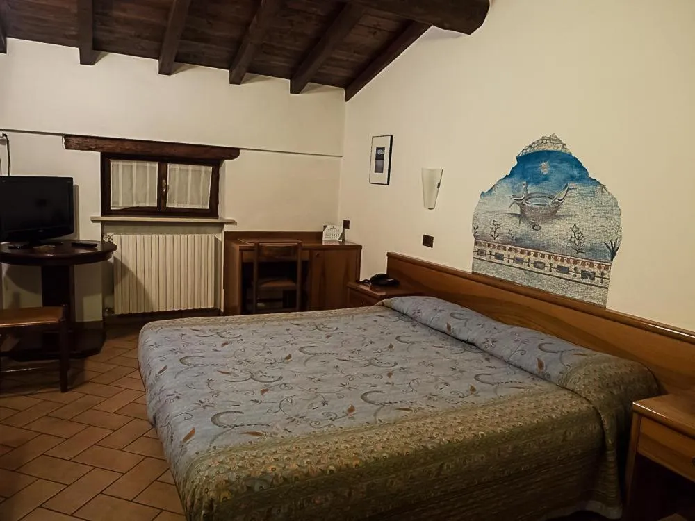Bed in Albergo Giulia Gonzaga