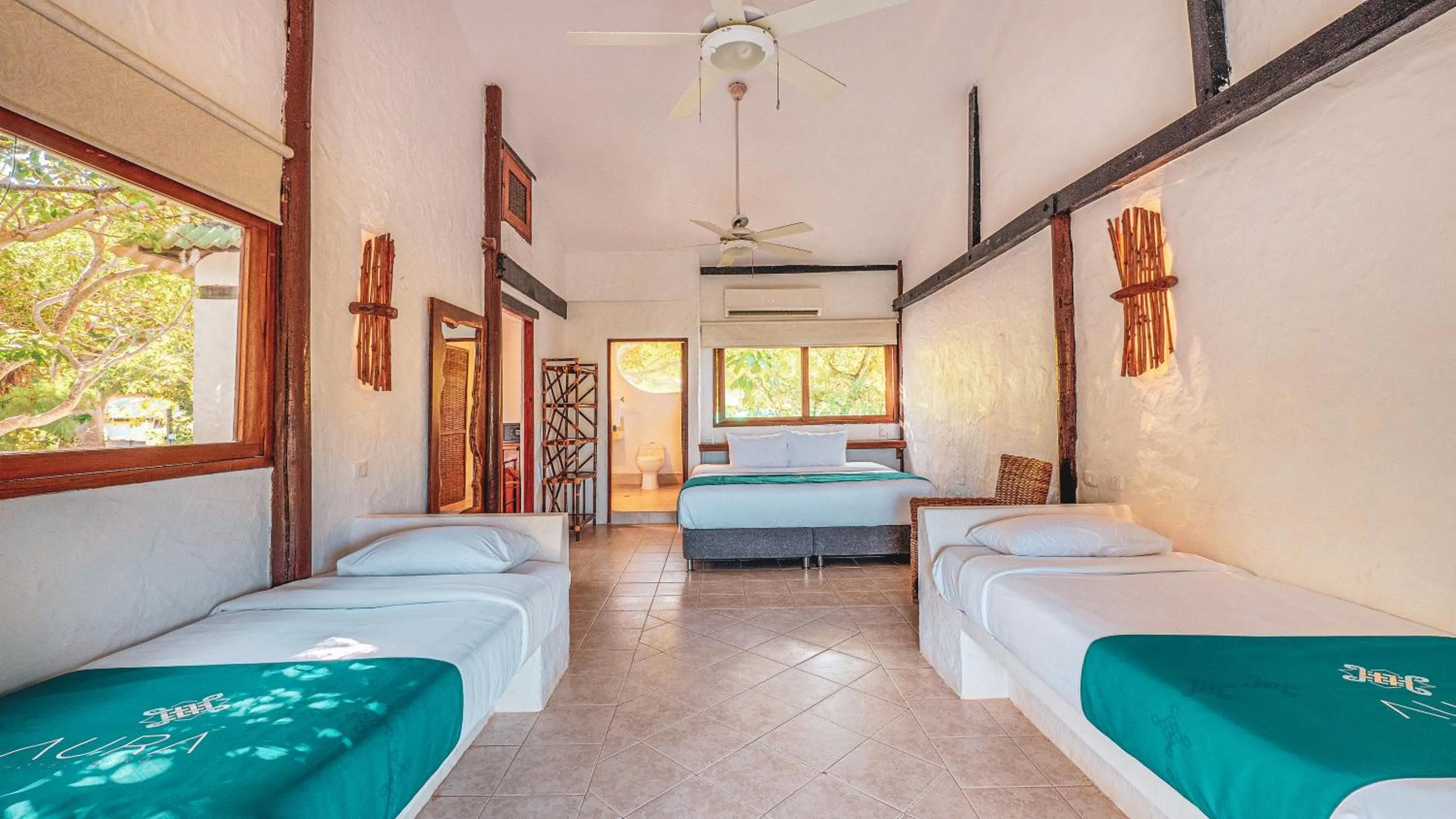 Bed in Aura Hotel Barú