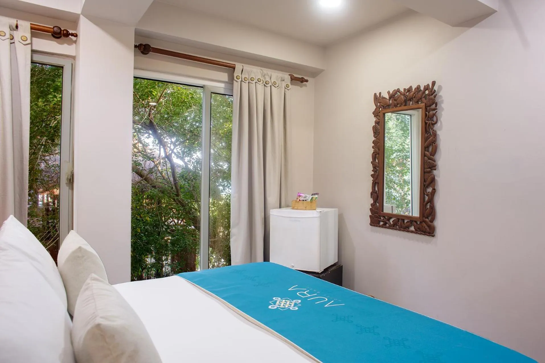 Bed in Aura Hotel Barú