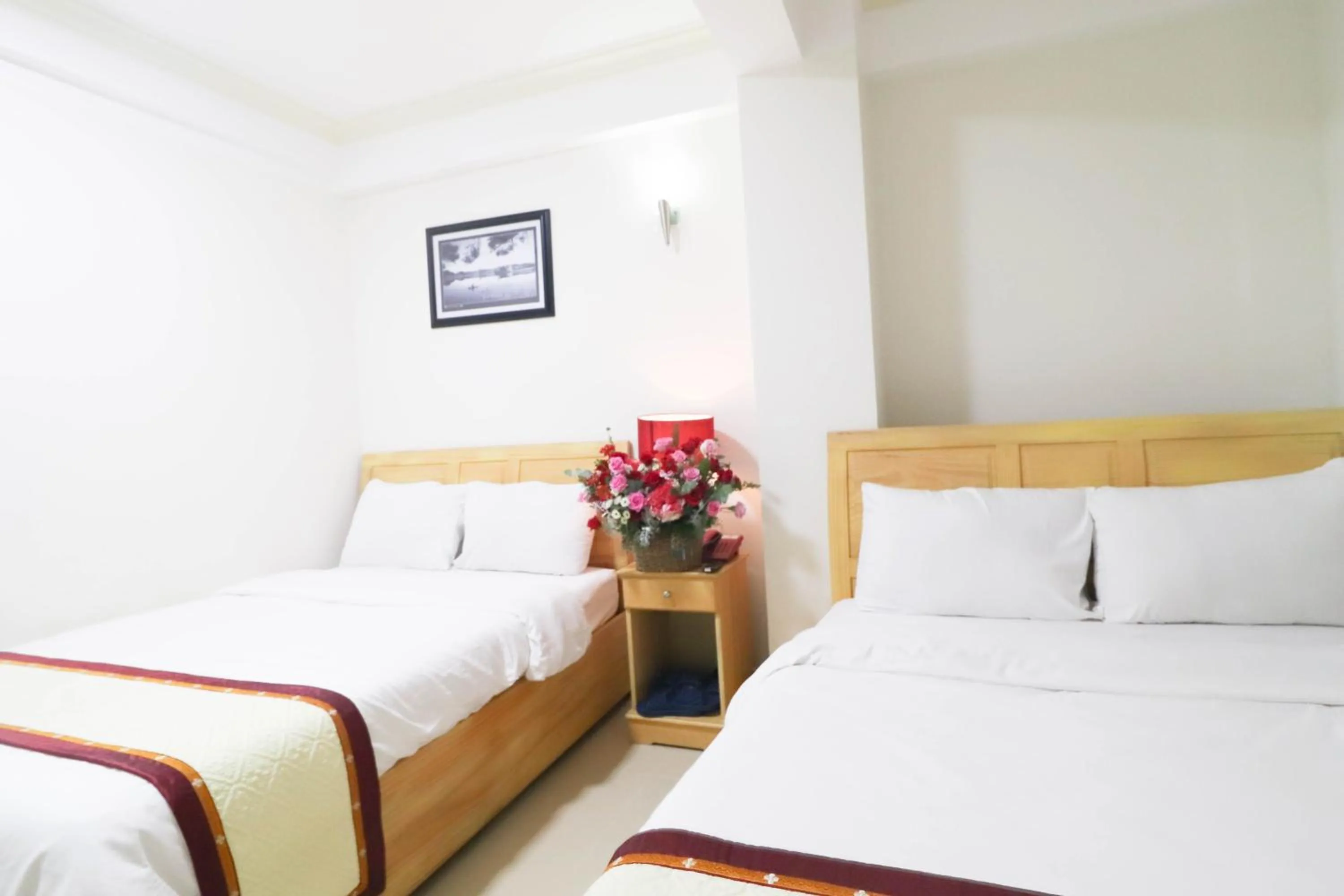 Bed in Mai Hoang Da Lat Hotel