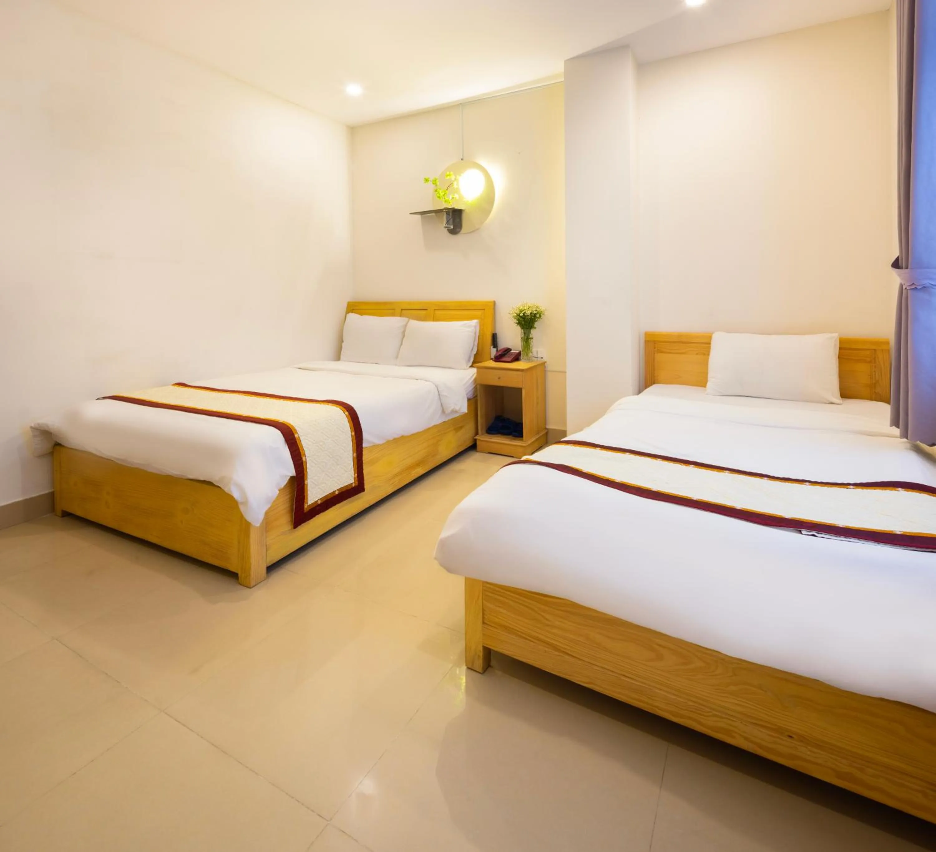 Bed in Mai Hoang Da Lat Hotel