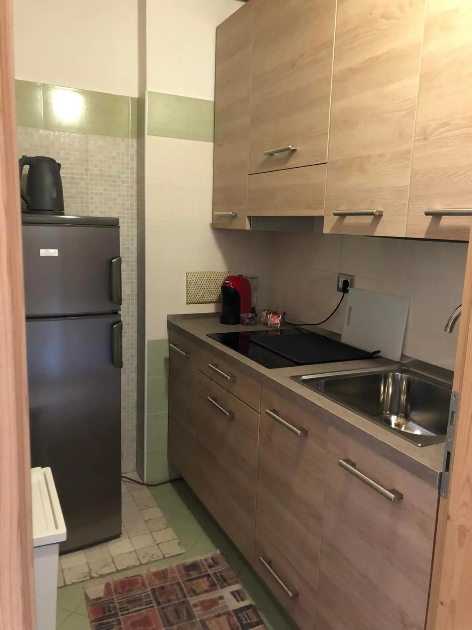 Kitchen or kitchenette in Appartamenti Camere Masi Brenta