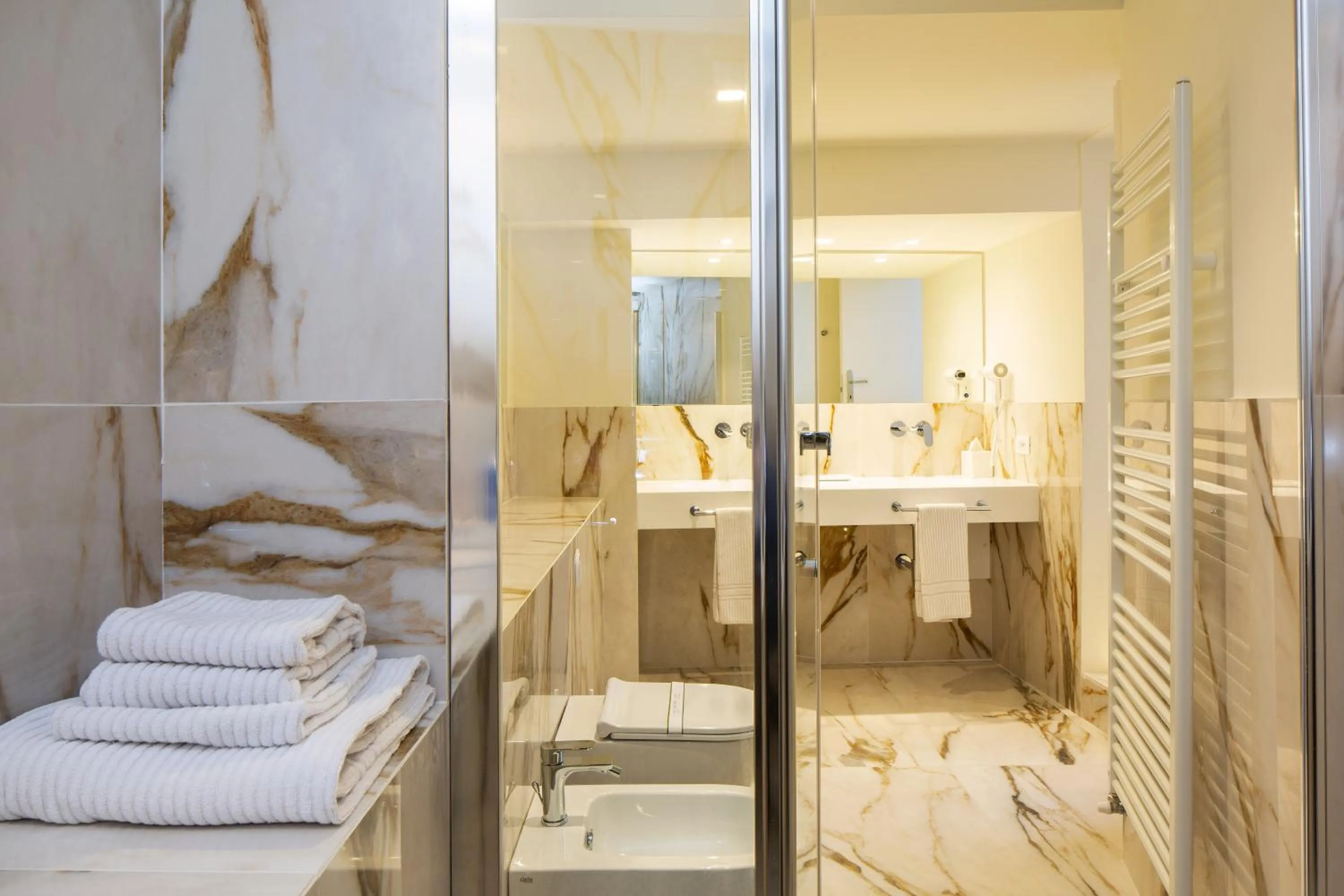 Bed in Giotto Hotel & Spa