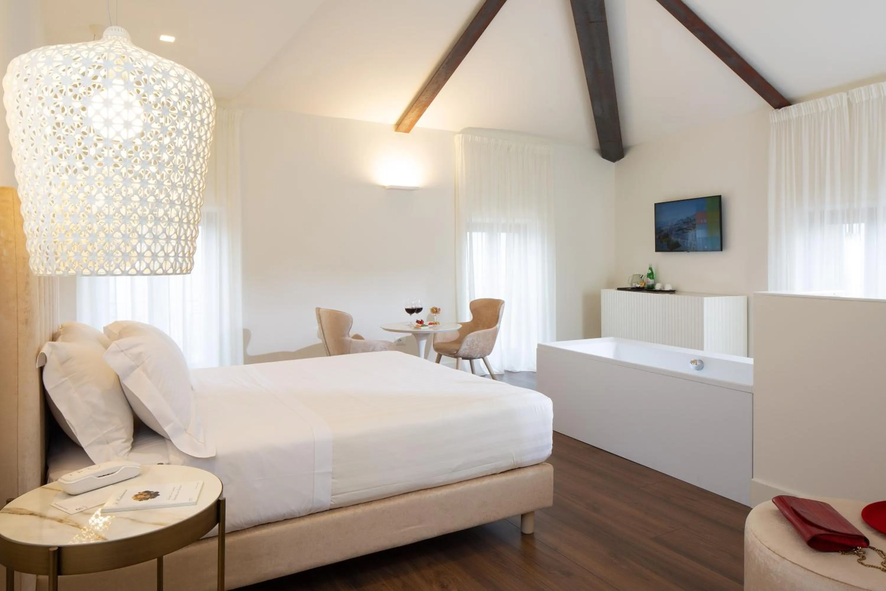 Bed in Giotto Hotel & Spa