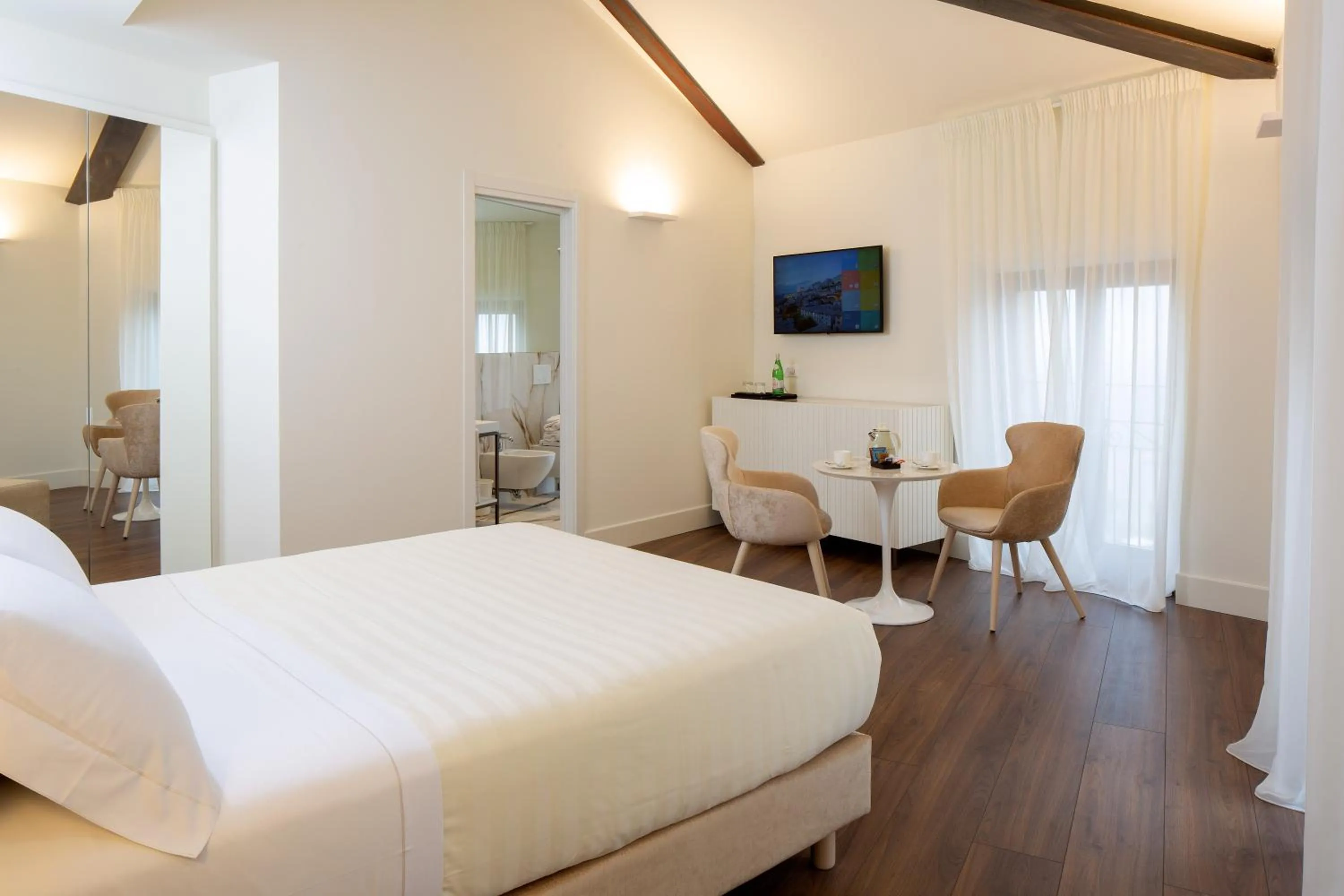 Bed in Giotto Hotel & Spa