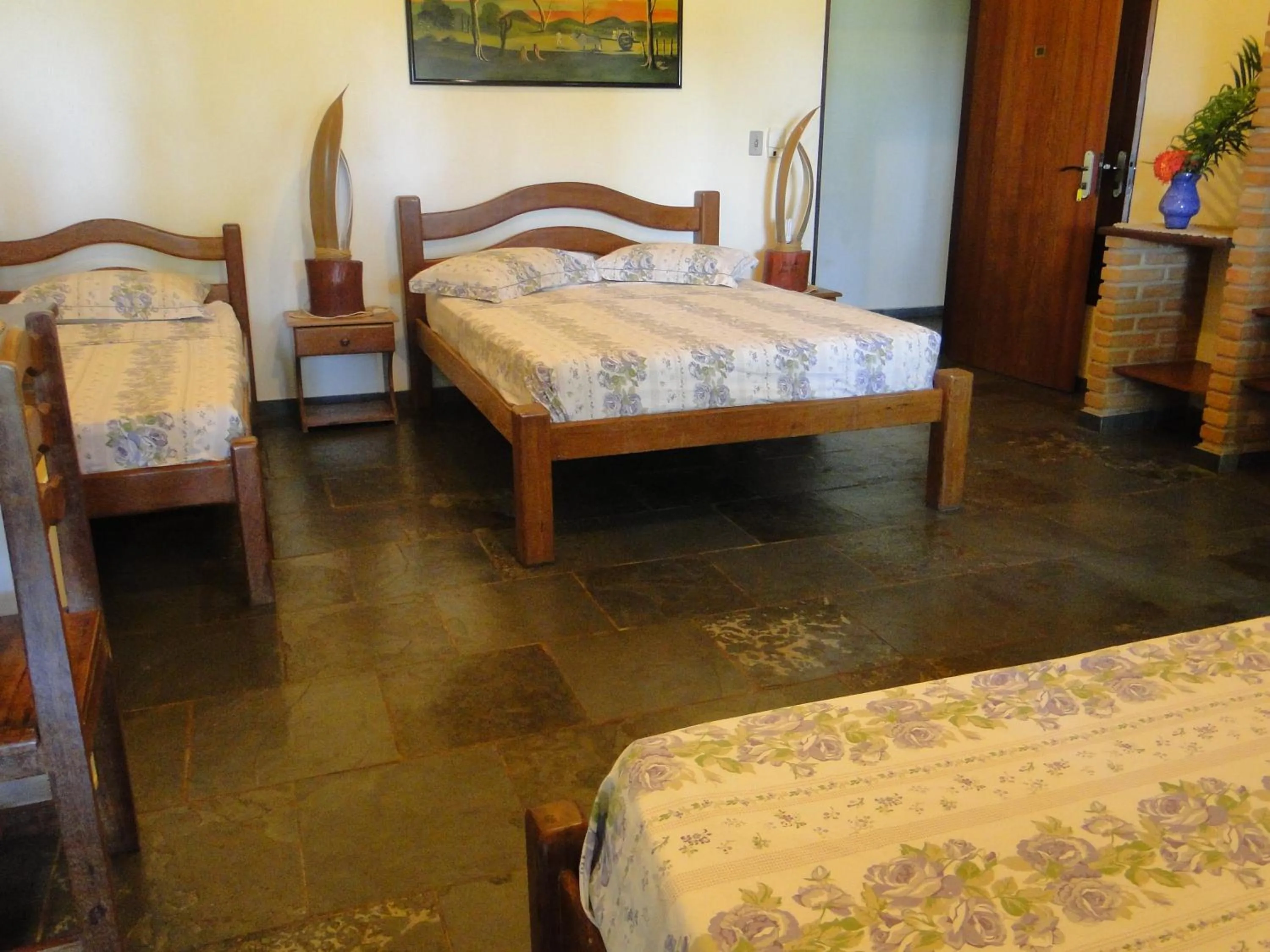 Bed in Hotel Pousada Arco Iris