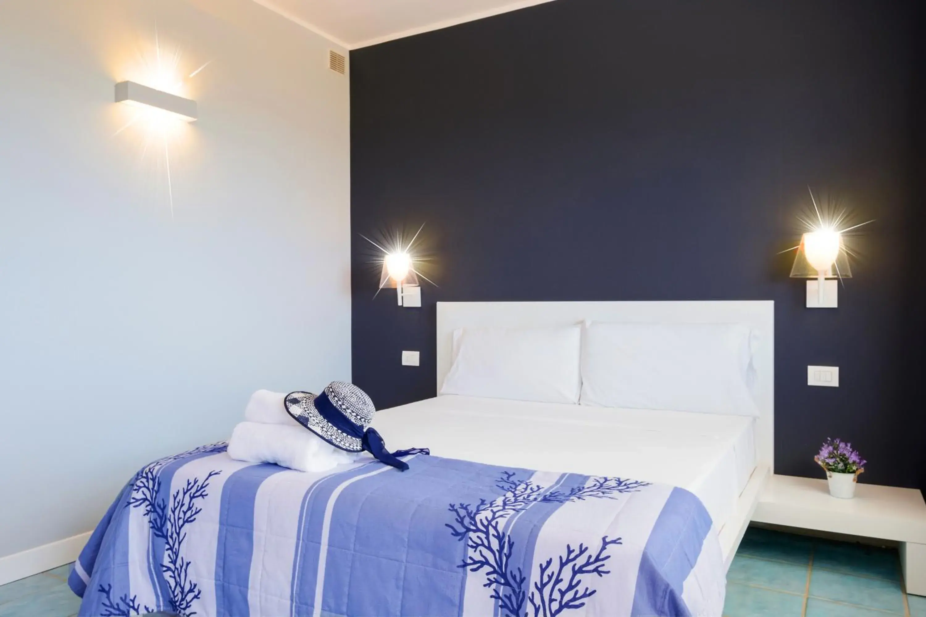 Triple Room with Mountain View in Borgo di Fiuzzi Resort & SPA Triple Room with Mountain View in Borgo di Fiuzzi Resort & SPA