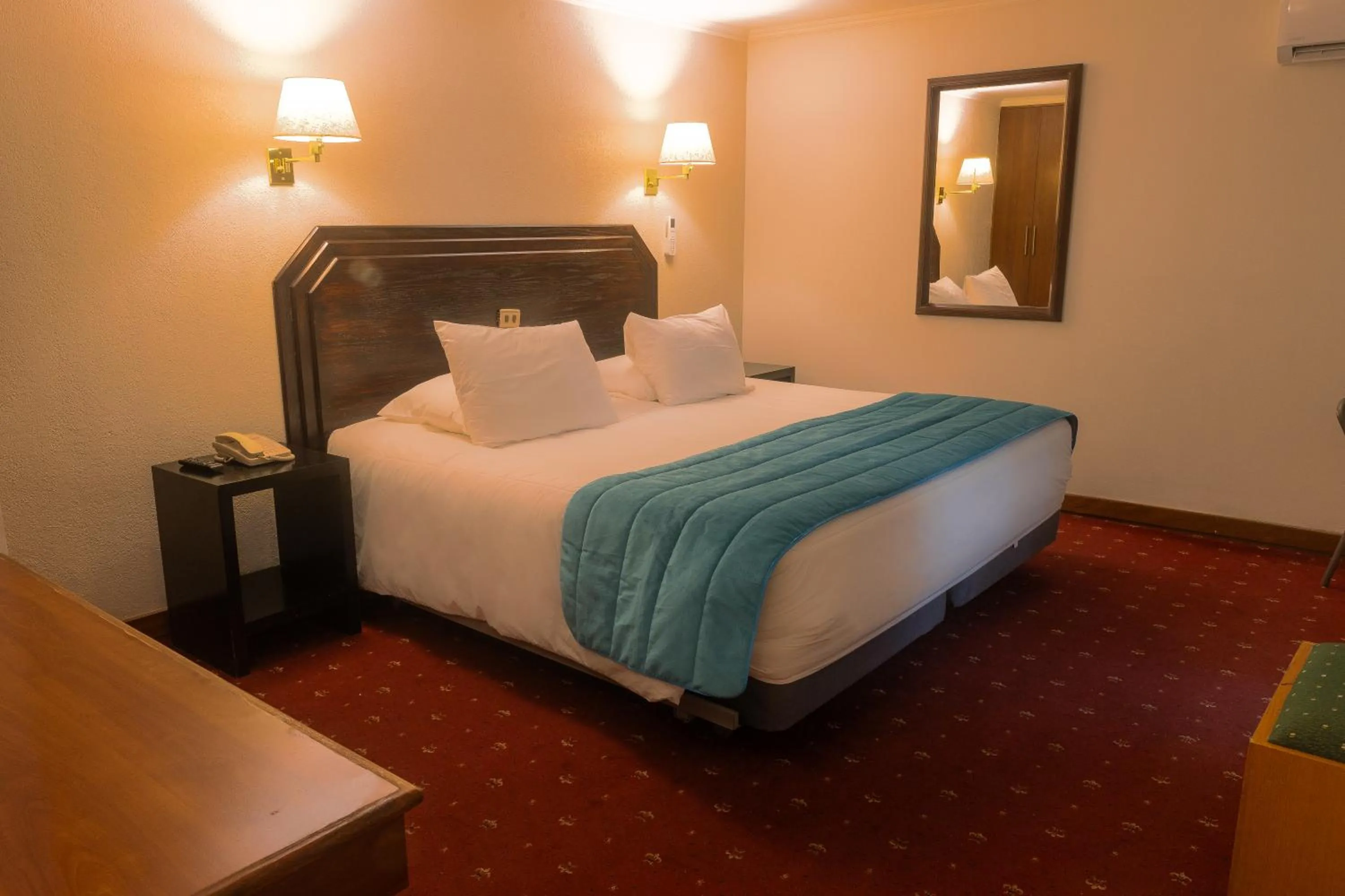 Bed in Hotel Gavina Express Arica