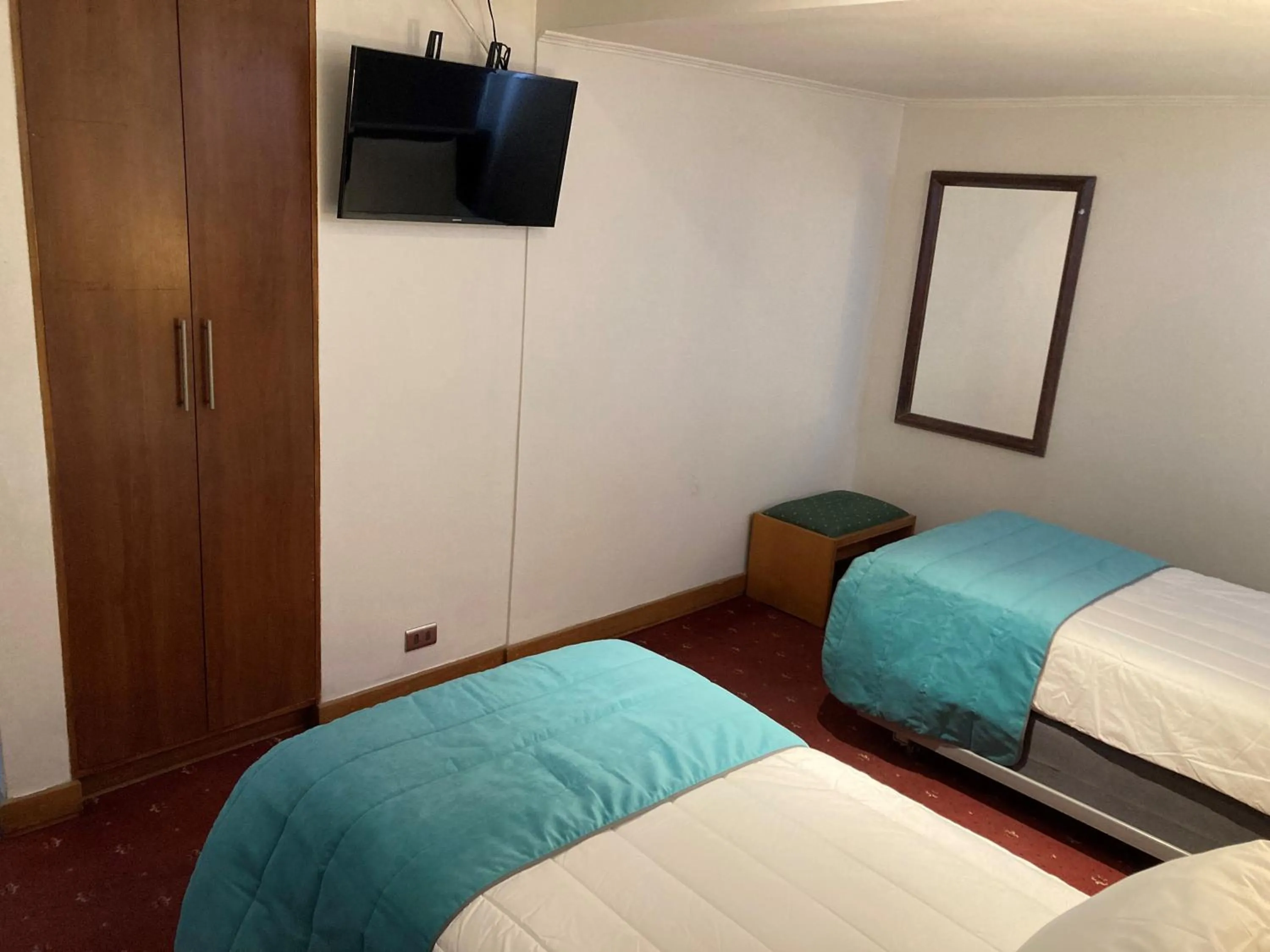 Bed in Hotel Gavina Express Arica