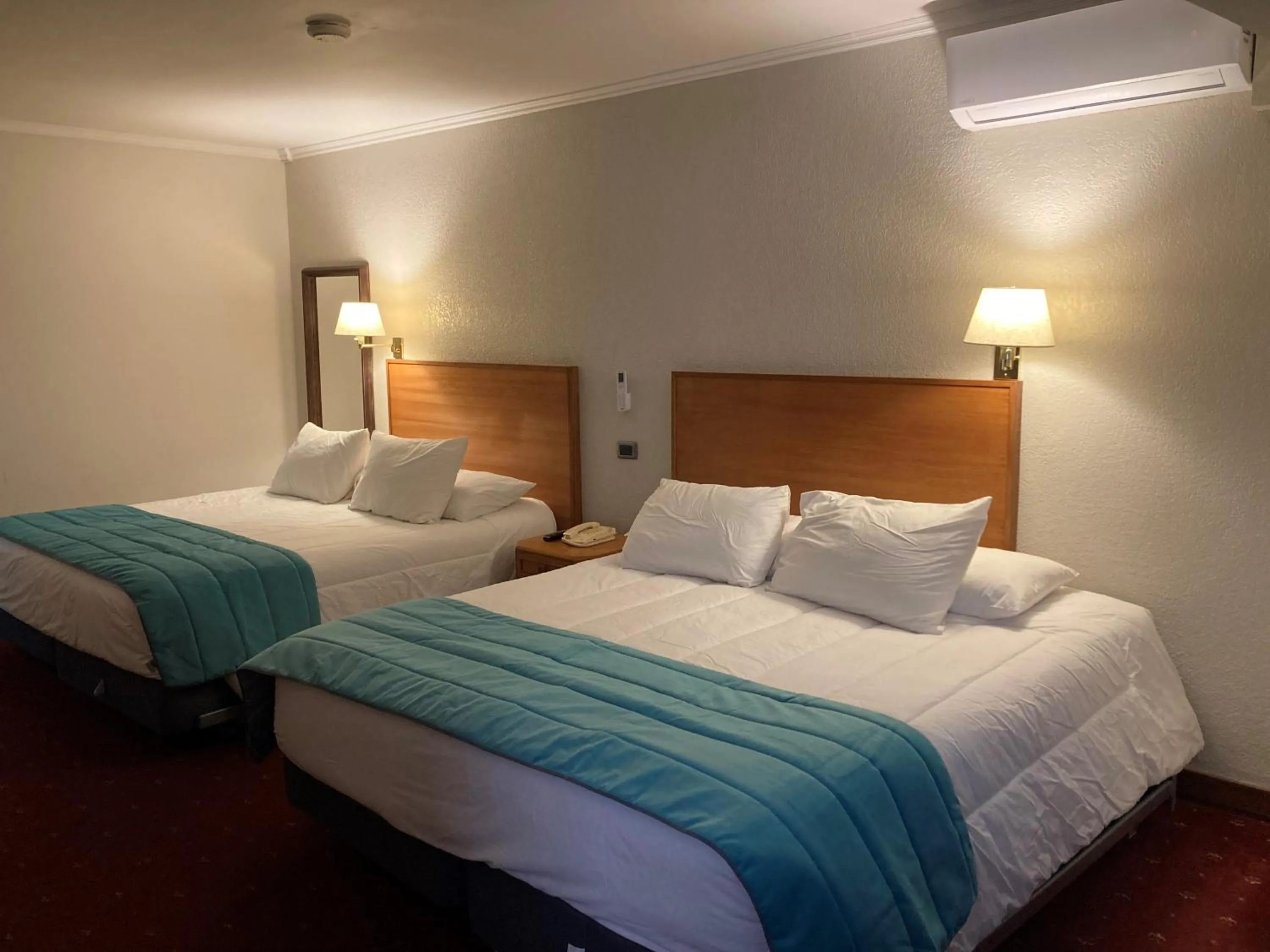 Bed in Hotel Gavina Express Arica