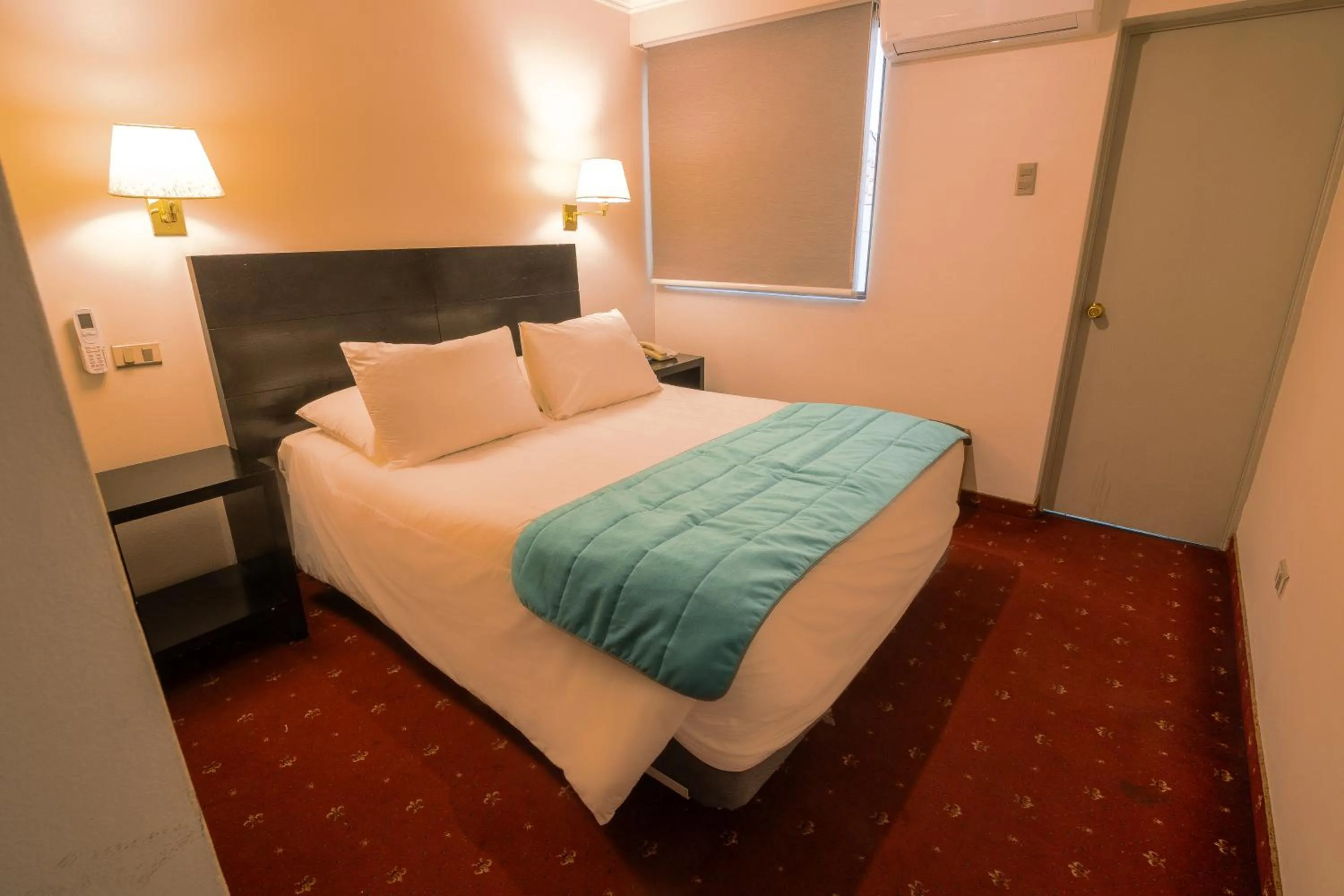 Bed in Hotel Gavina Express Arica