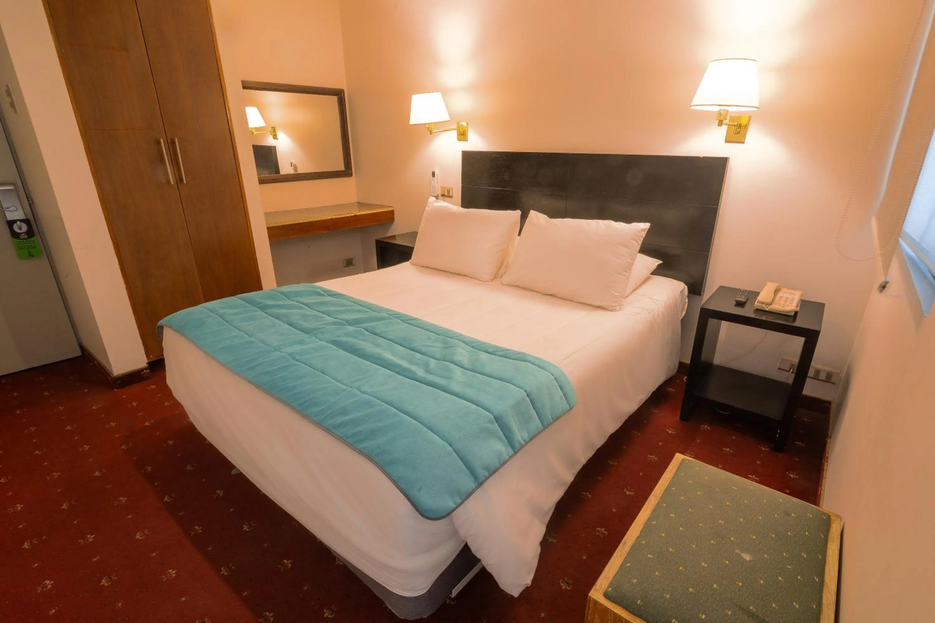 Bed in Hotel Gavina Express Arica