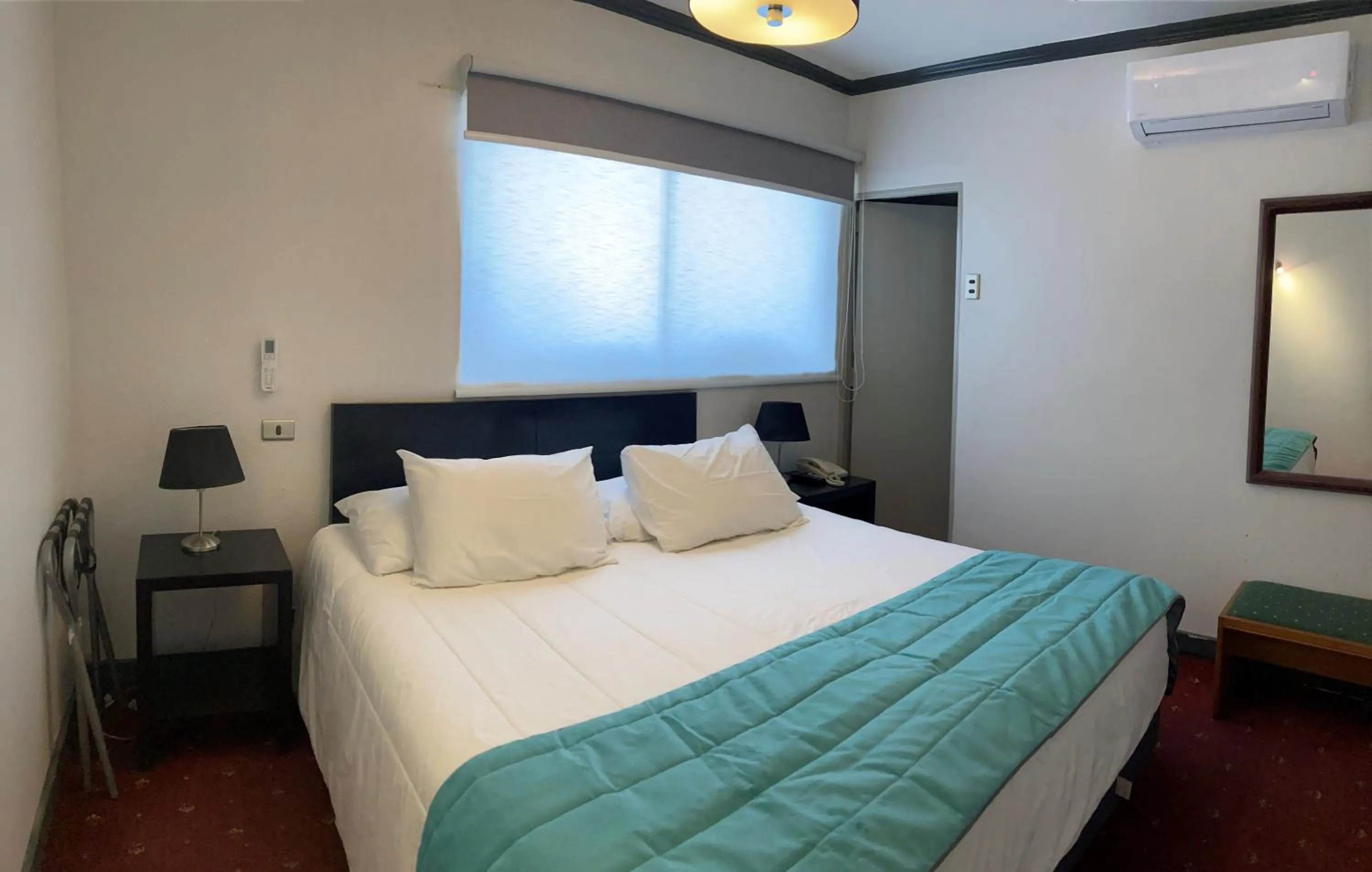 Bed in Hotel Gavina Express Arica