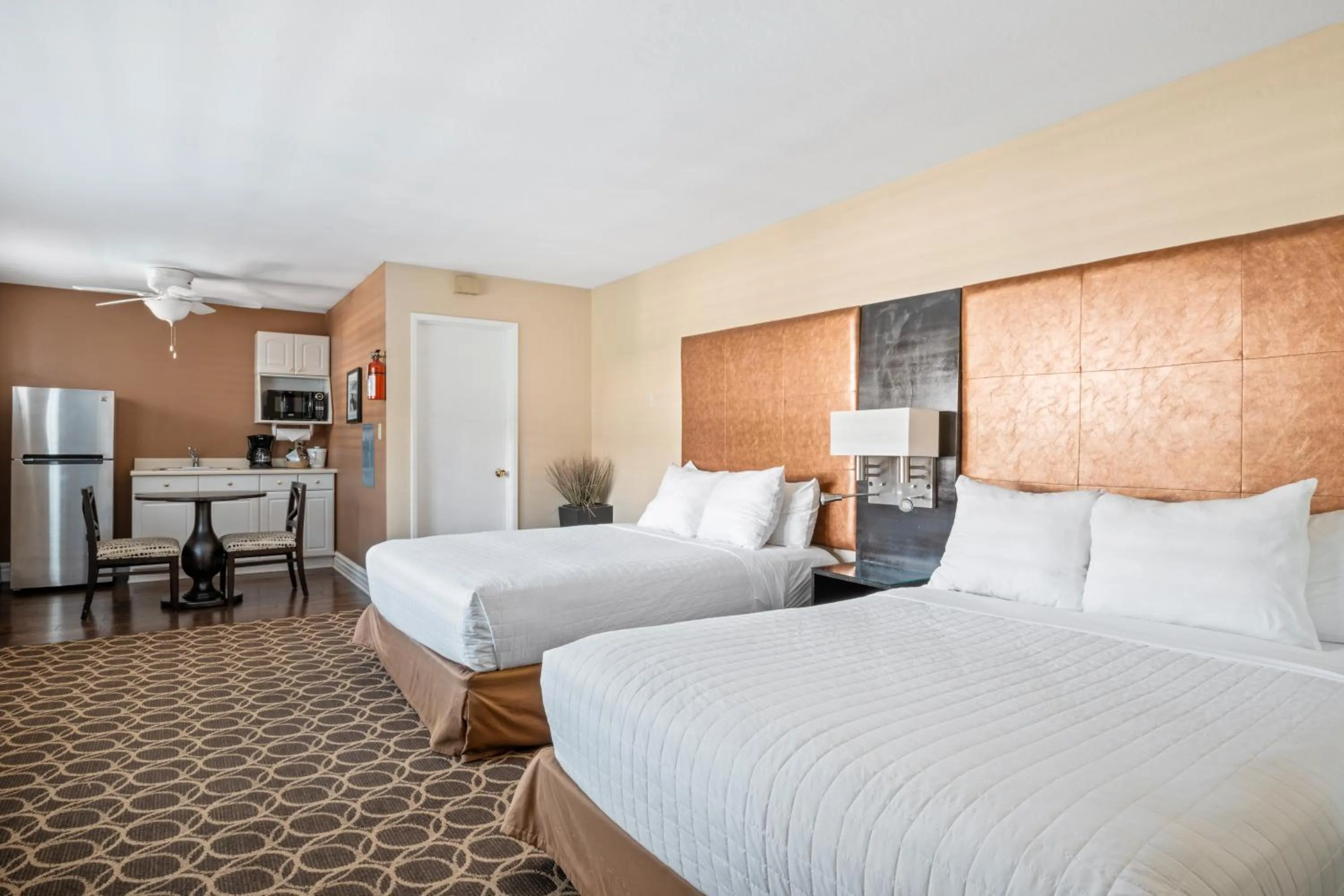 Bed in Marin Suites Hotel