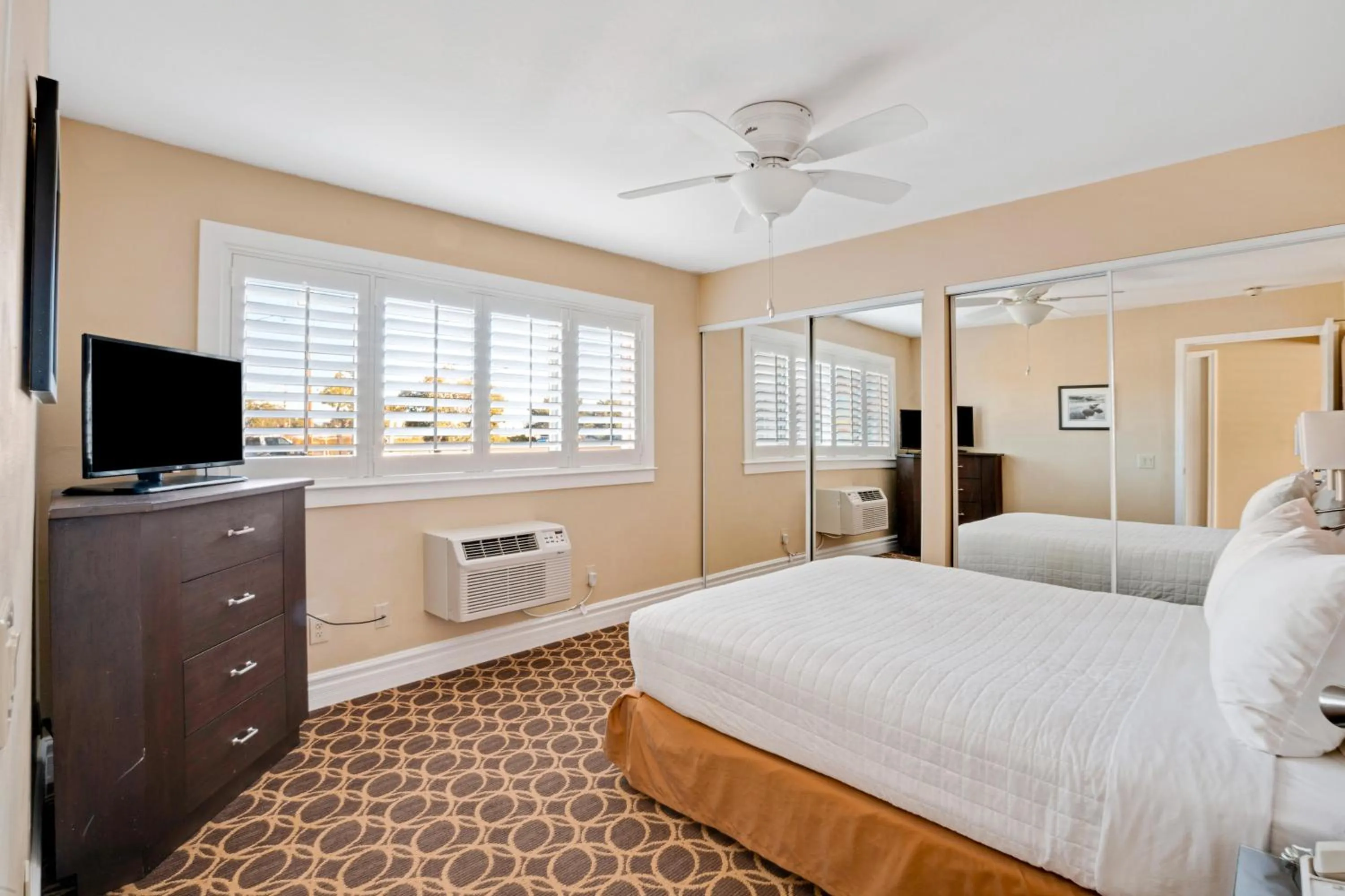 Bed in Marin Suites Hotel