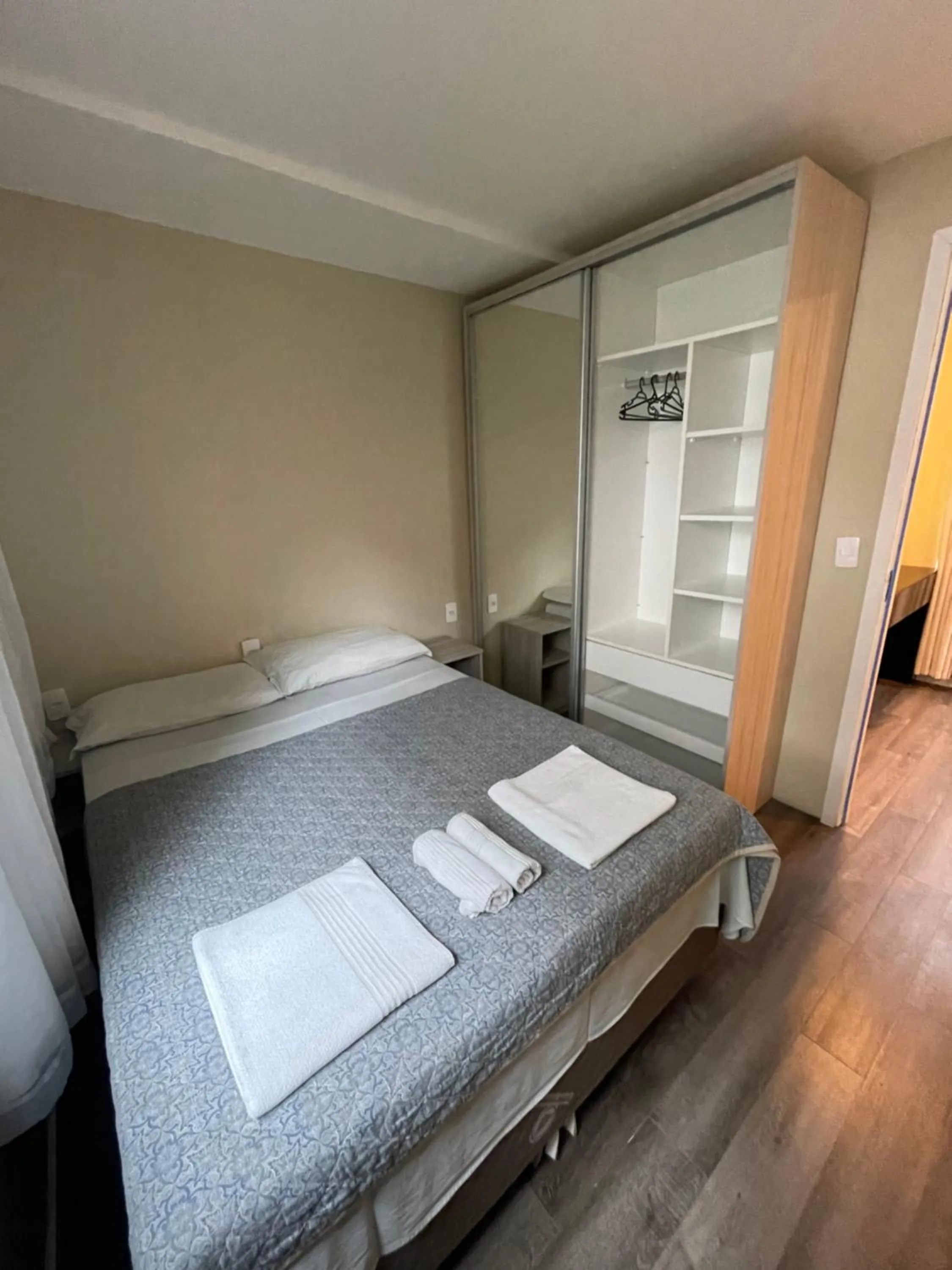 Bed in Pousada Tissiano