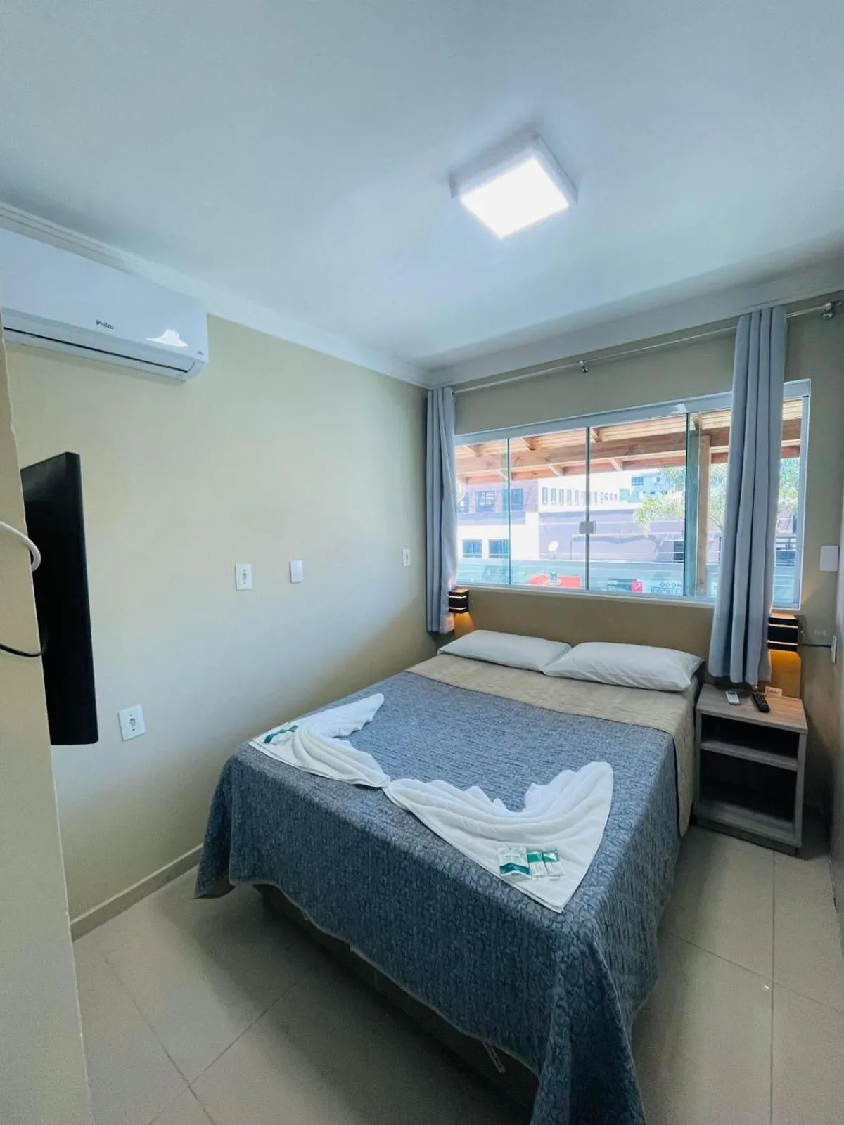 Bed in Pousada Tissiano