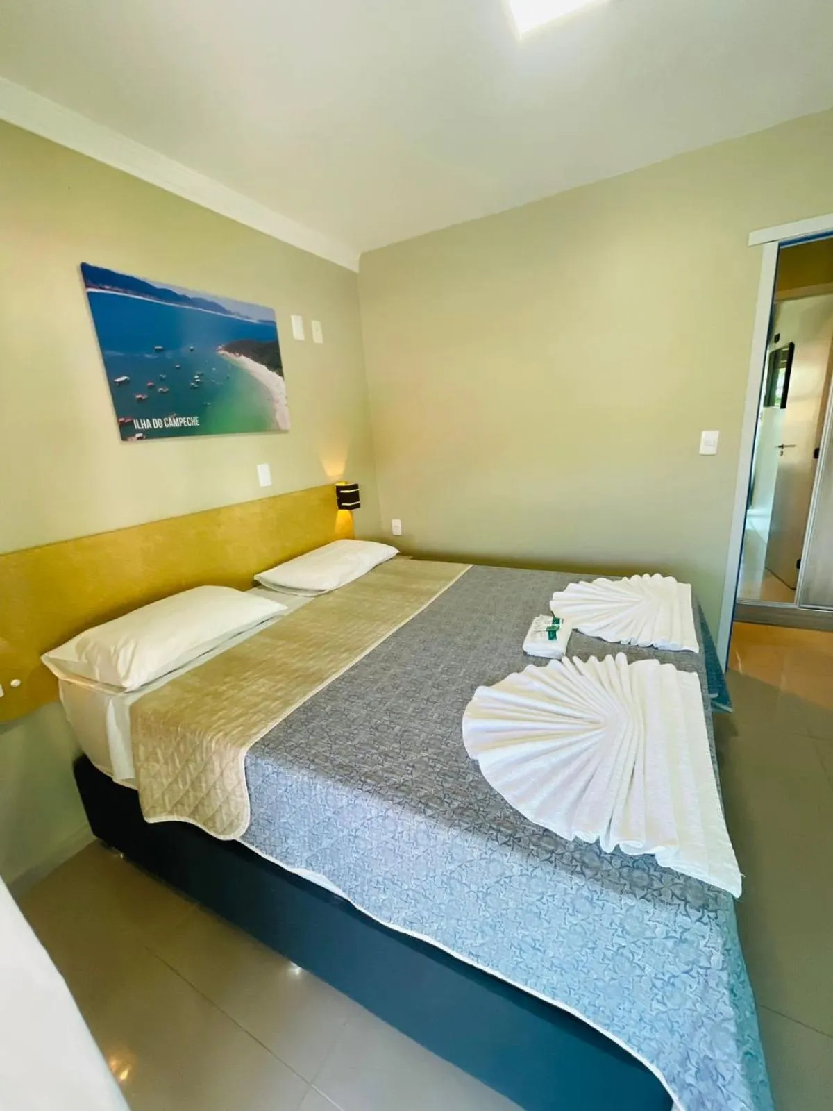 Bed in Pousada Tissiano