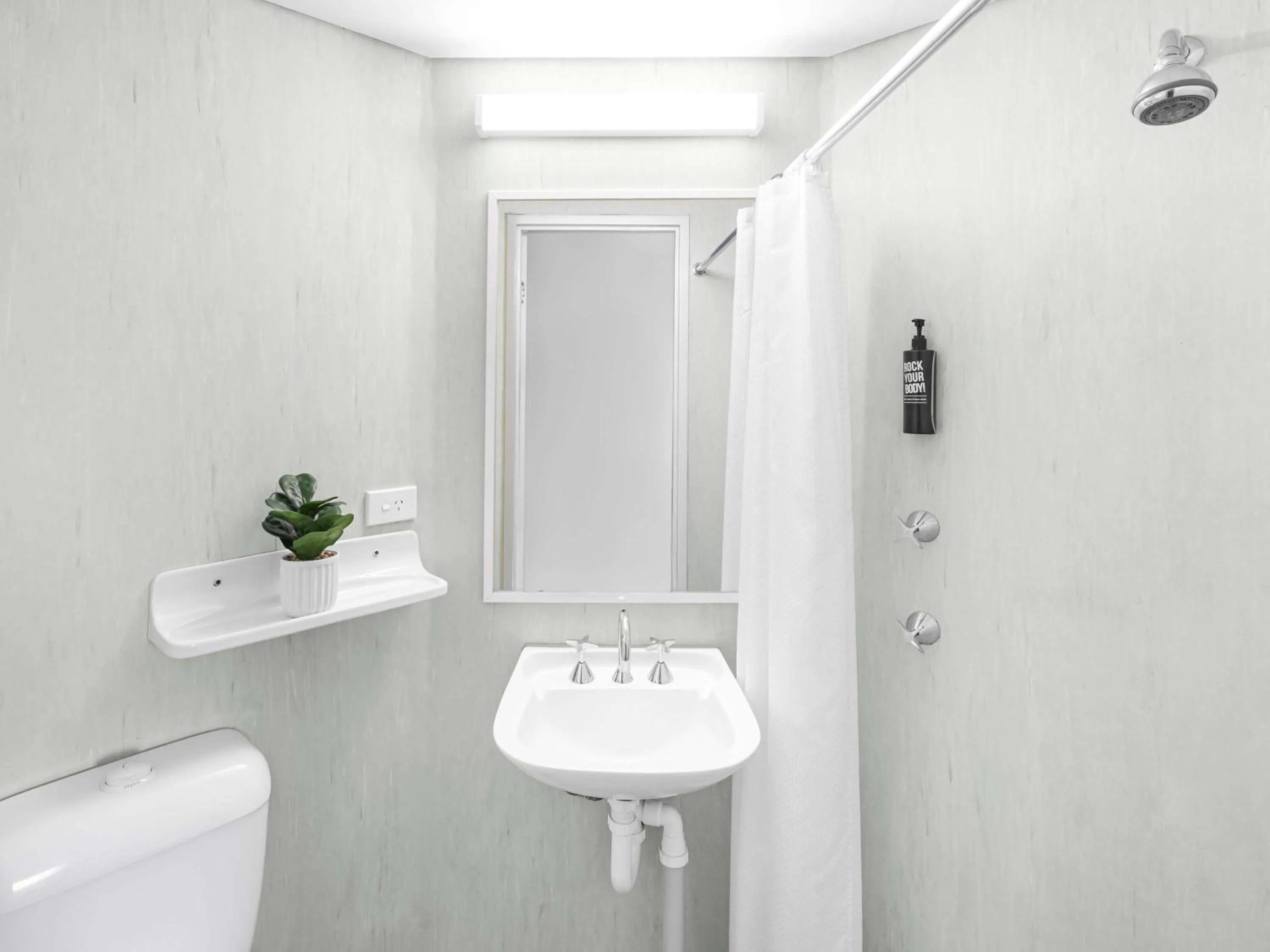 Bedroom in ibis Budget Coffs Harbour