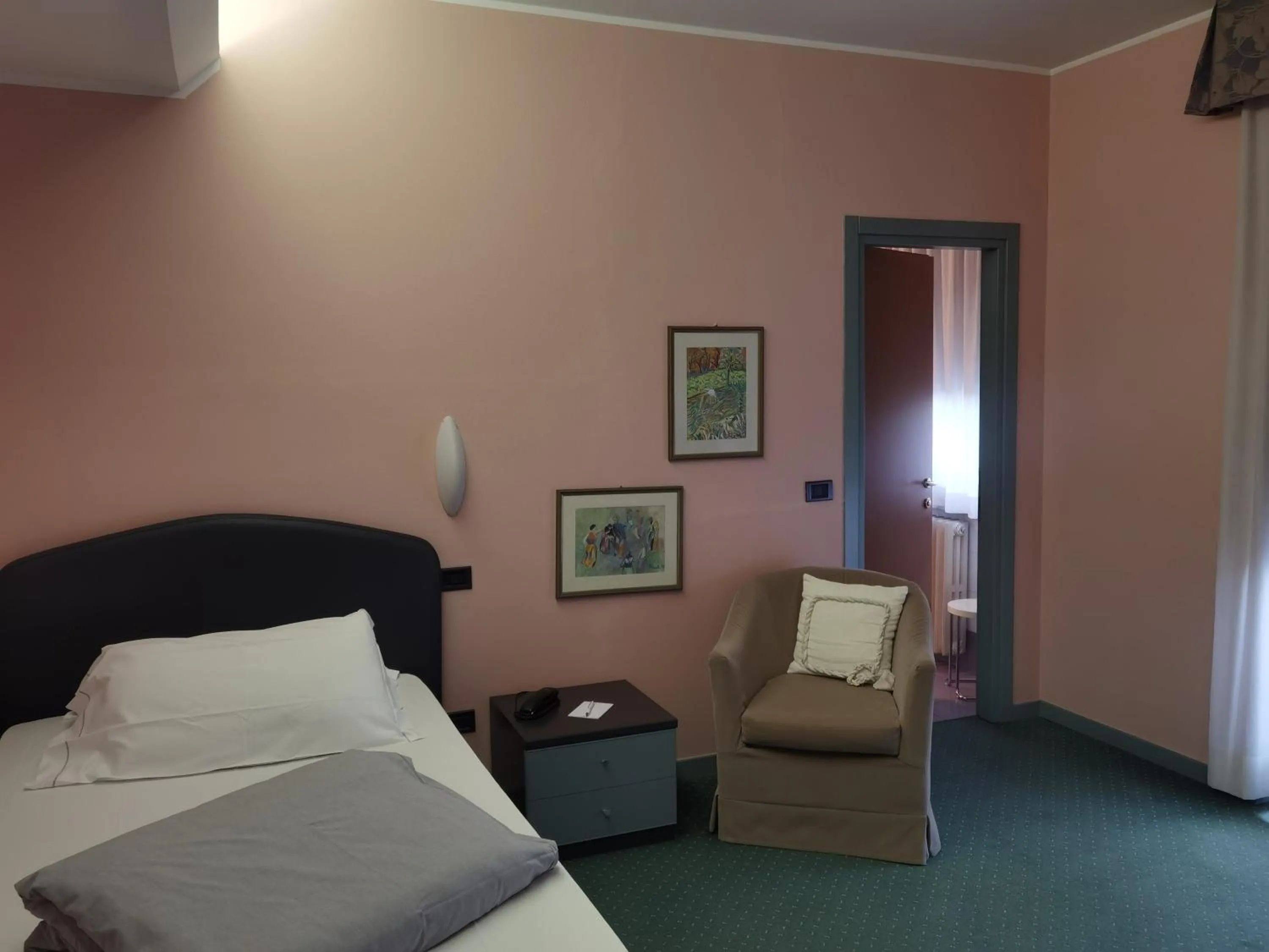 Bed in Hotel Vittoria