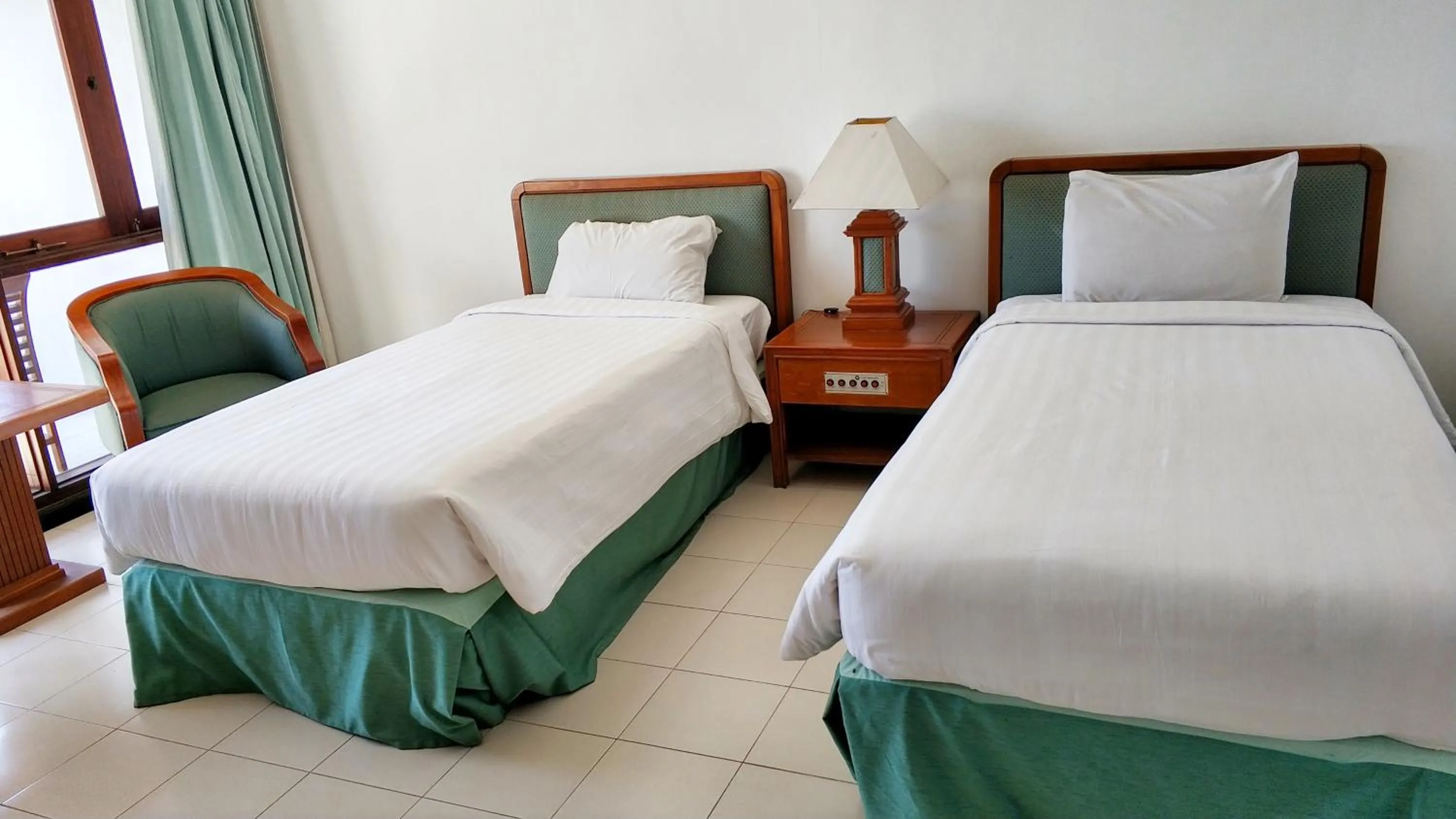 Bed in Grand Whiz Hotel Bromo