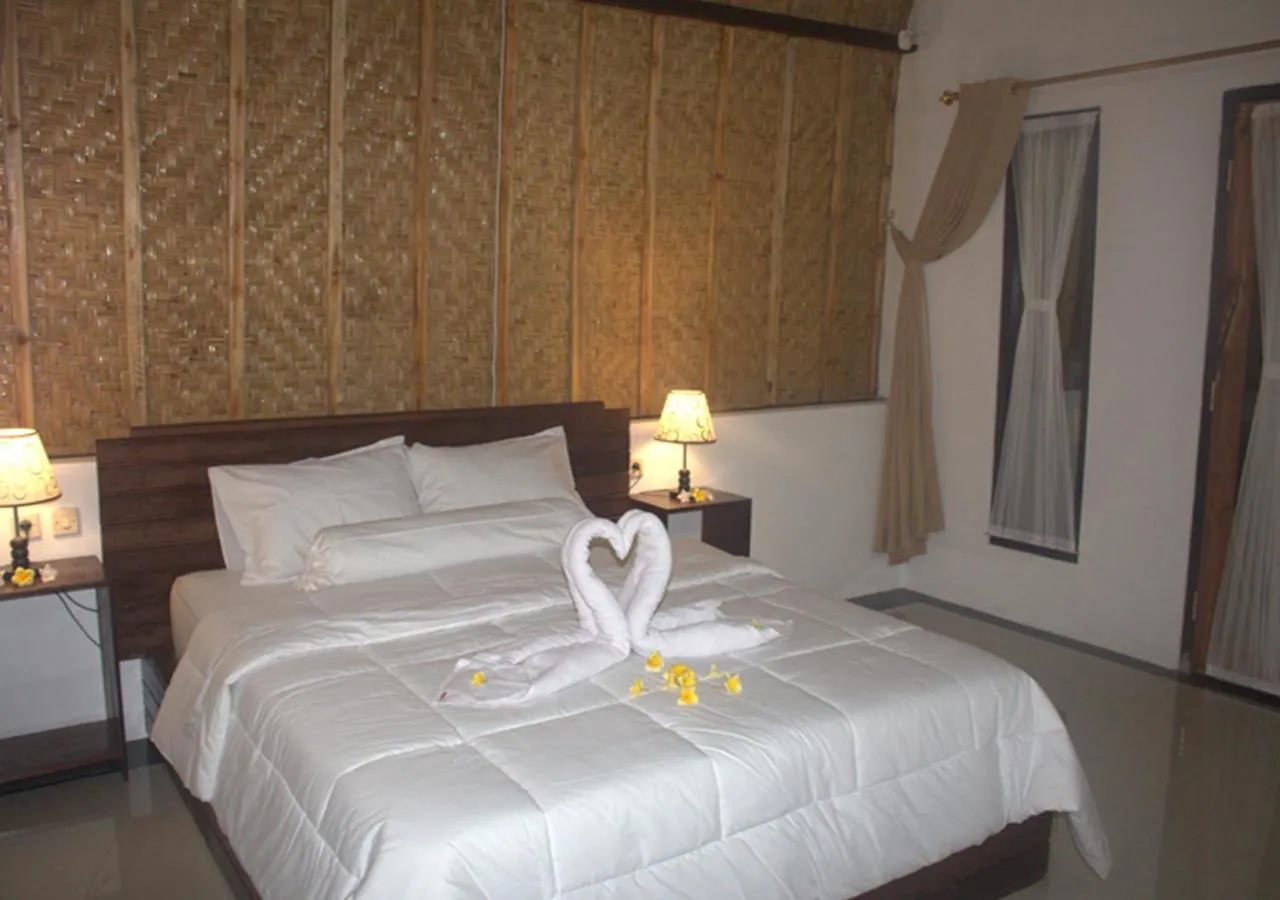 Bed in Sebrang Hills Bungalow