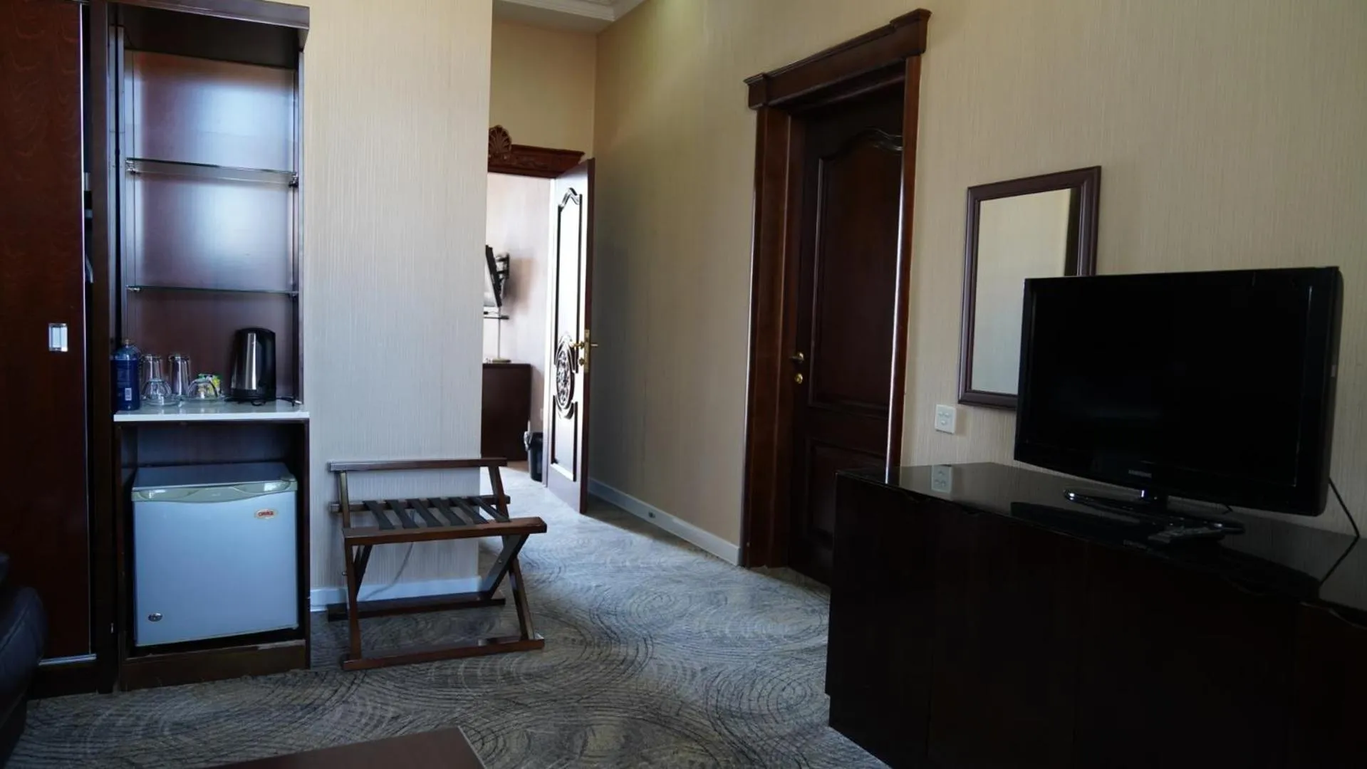 Communal lounge/ TV room in Premier Hotel