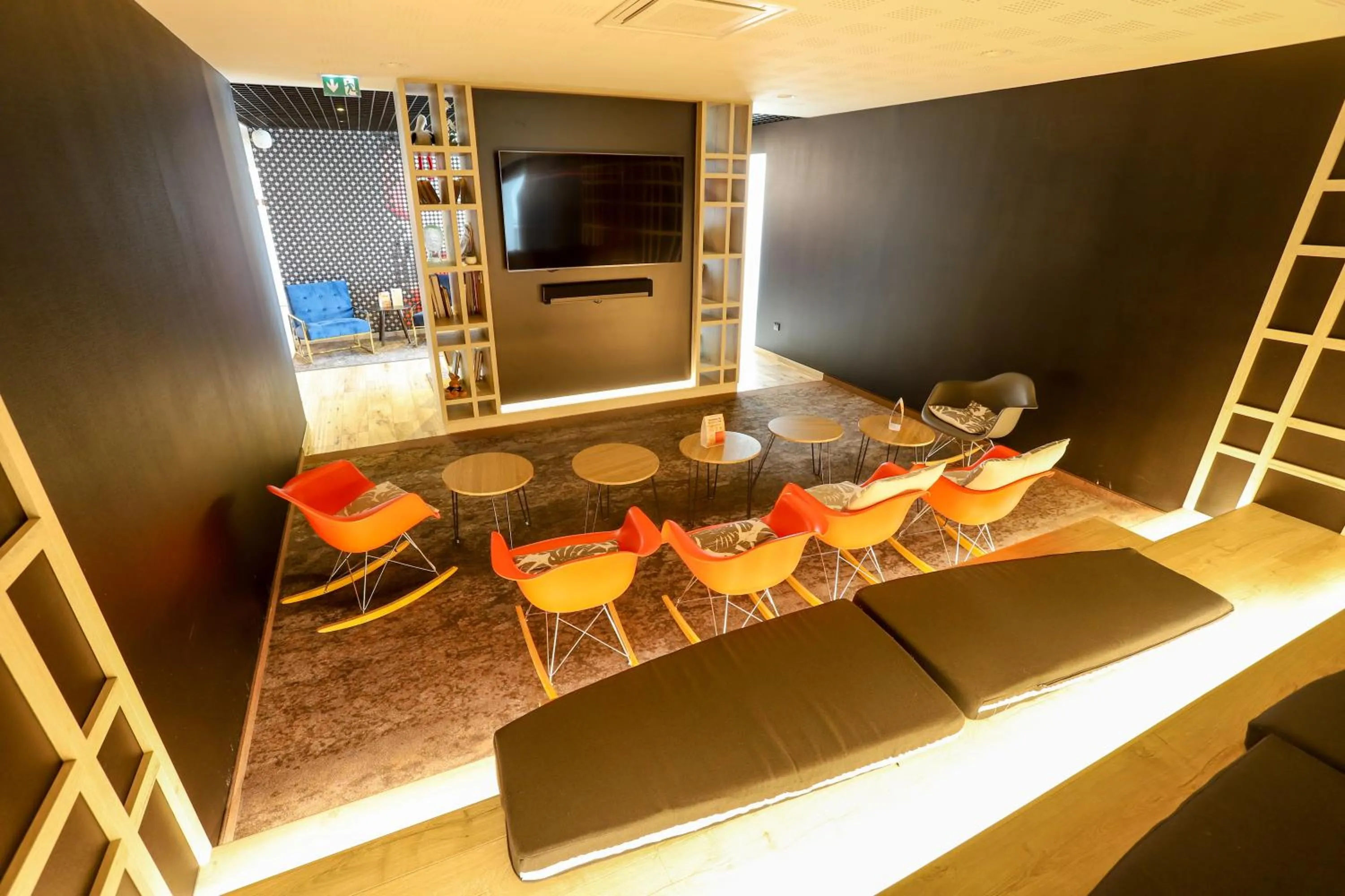 Communal lounge/ TV room in ibis Haguenau Strasbourg Nord